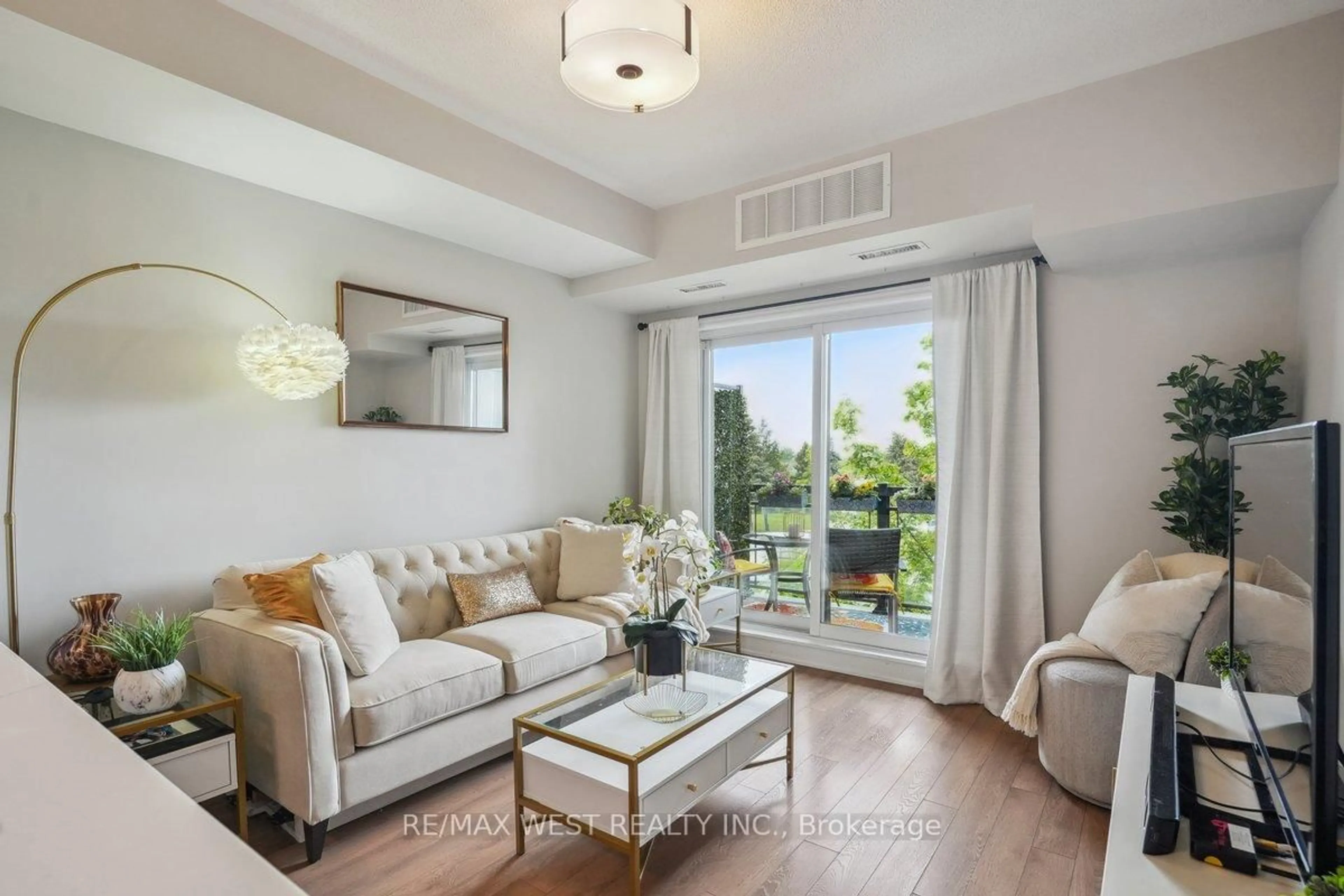 Living room with furniture, unknown for 570 Lolita Gdns #345, Mississauga Ontario L5A 0A1
