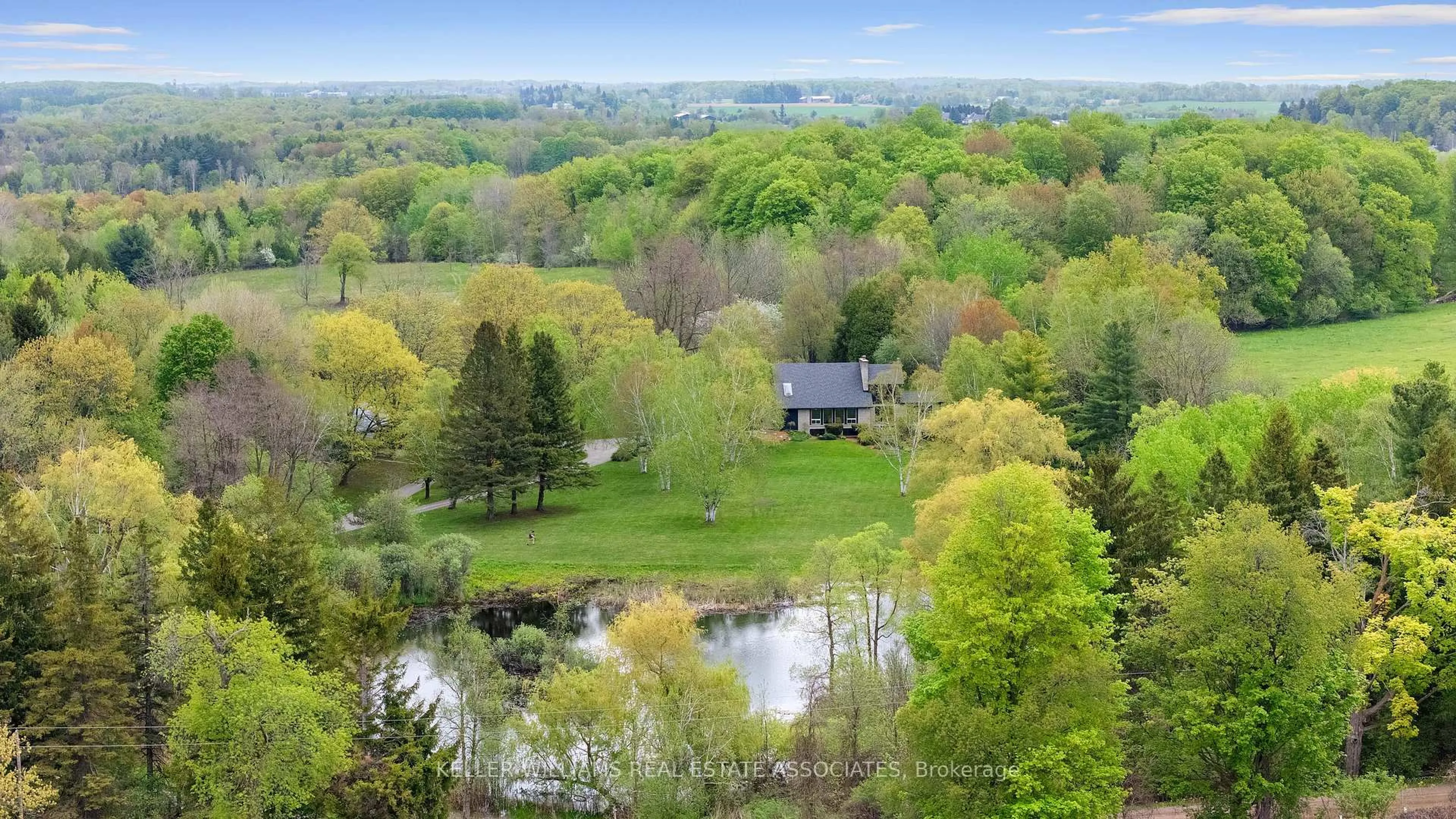 A pic from outside/outdoor area/front of a property/back of a property/a pic from drone, water/lake/river/ocean view for 15633 Kennedy Rd, Caledon Ontario L7C 2H7