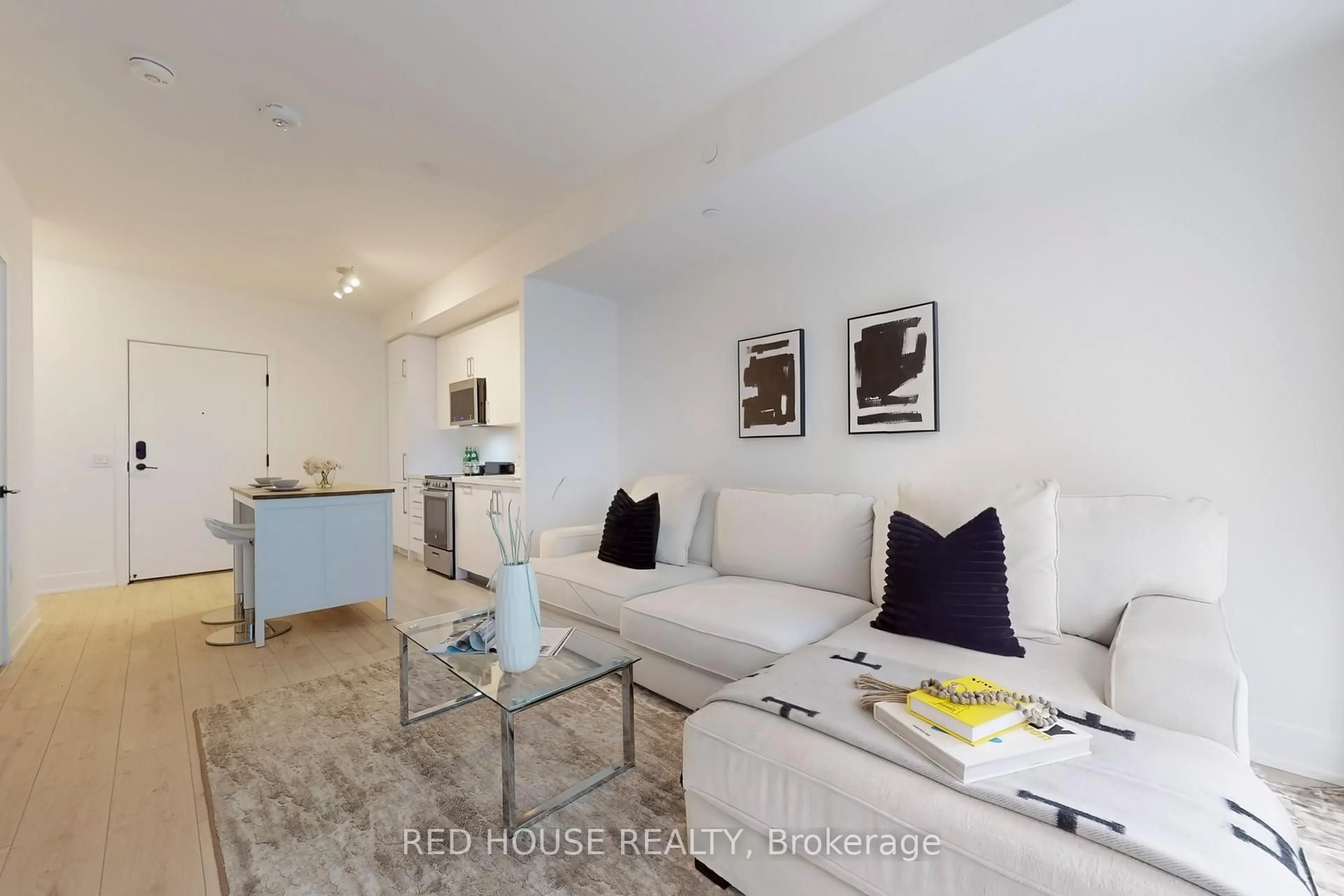 Living room with furniture, unknown for 2450 Old Bronte Rd #219, Oakville Ontario L6M 5P6
