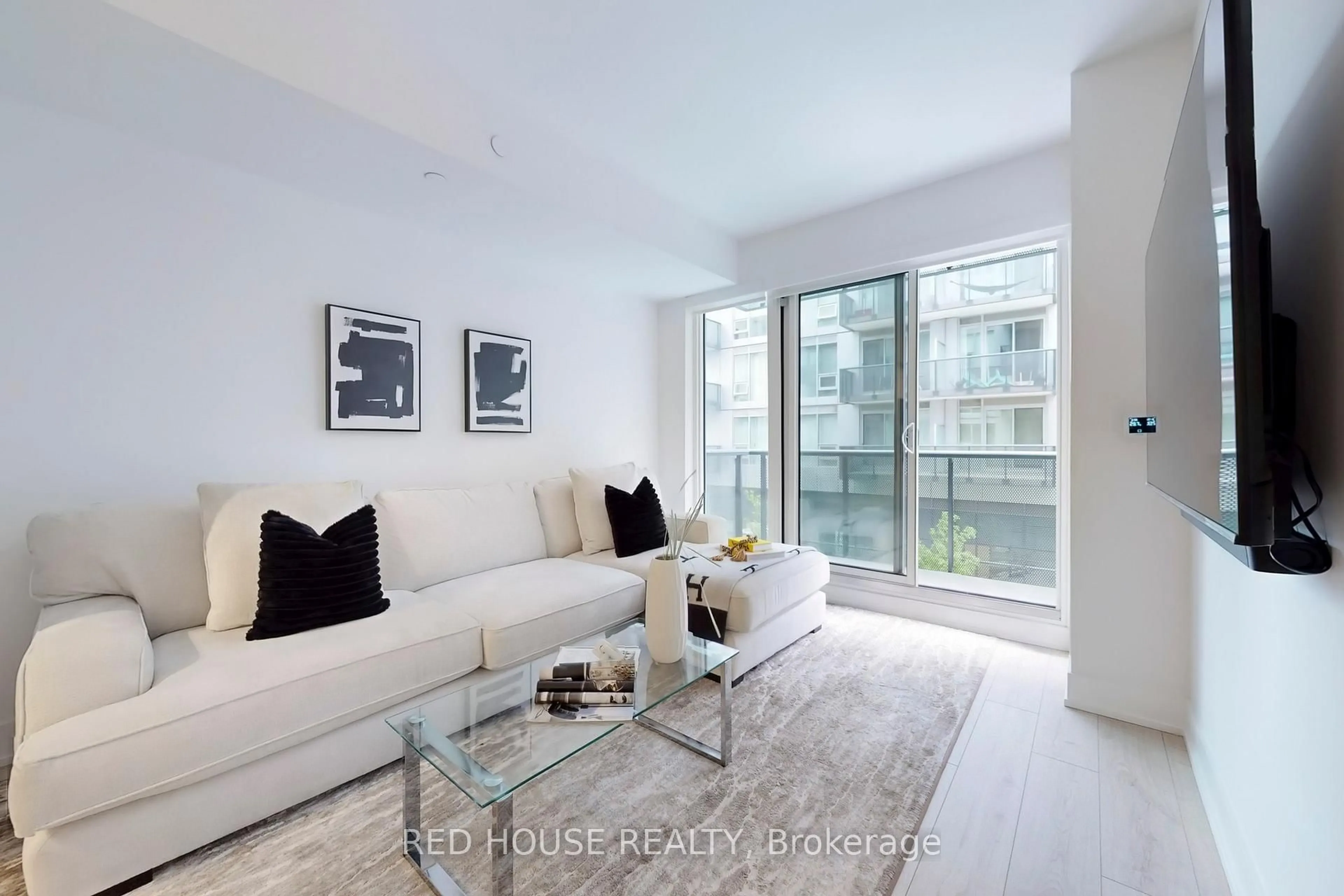 Living room with furniture, unknown for 2450 Old Bronte Rd #219, Oakville Ontario L6M 5P6