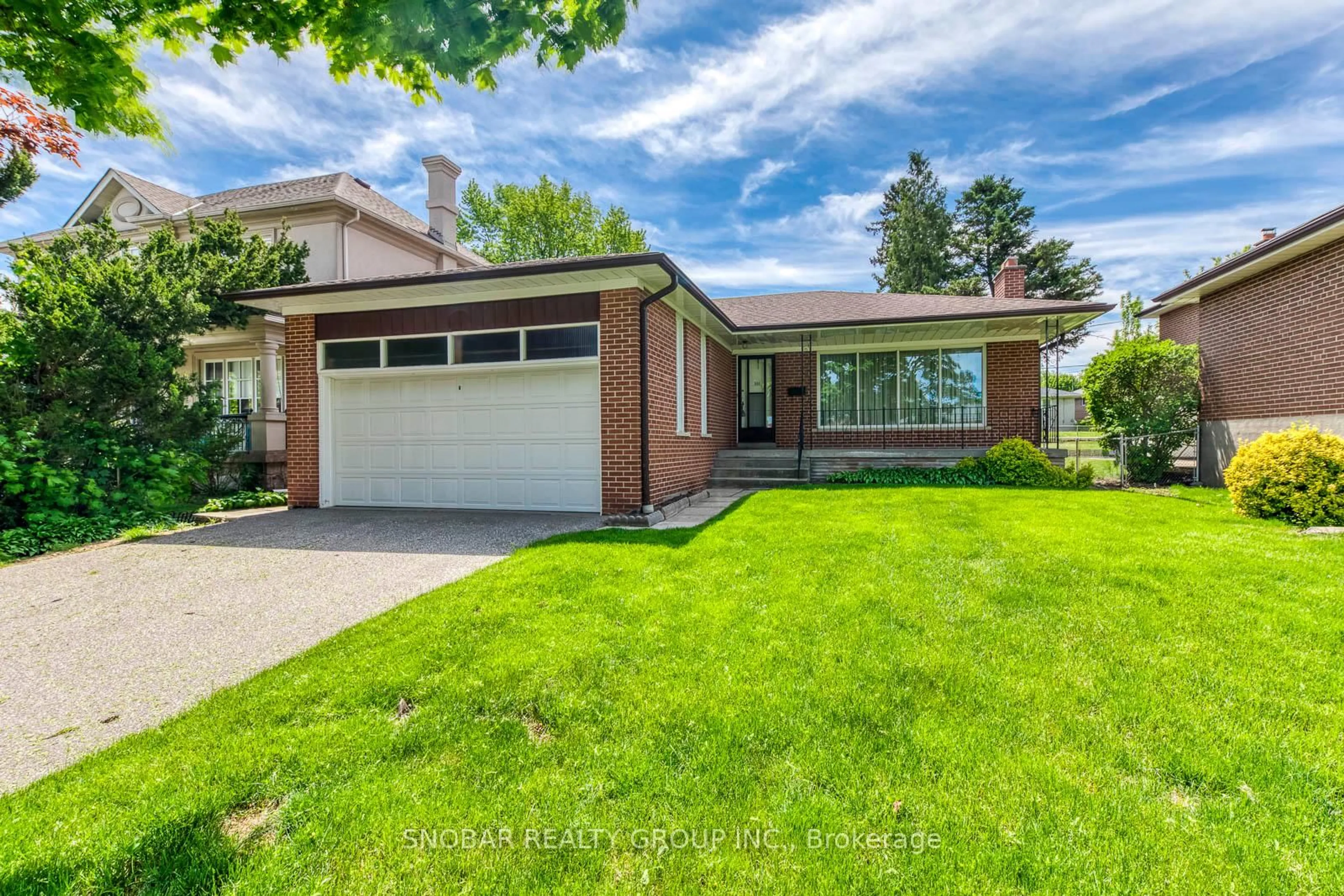 Home with brick exterior material, street for 301 La Rose Ave, Toronto Ontario M9P 1B8