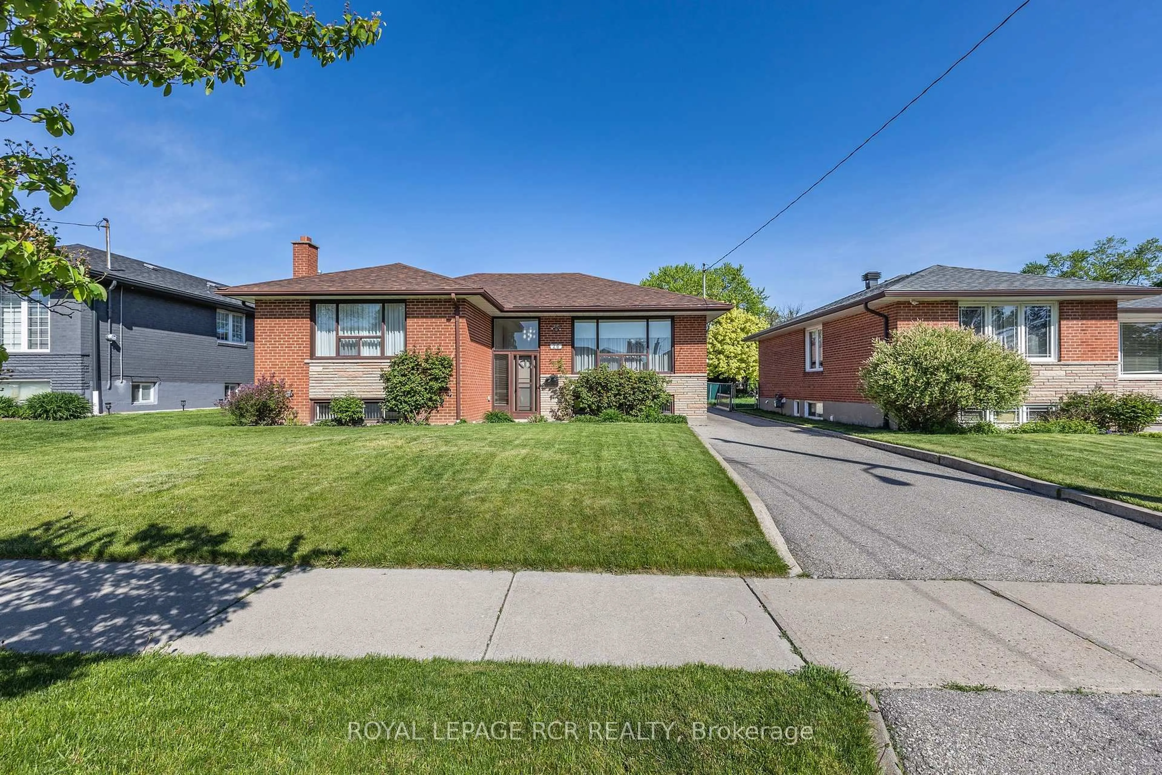 Home with brick exterior material, street for 26 Ludstone Dr, Toronto Ontario M9R 2H9