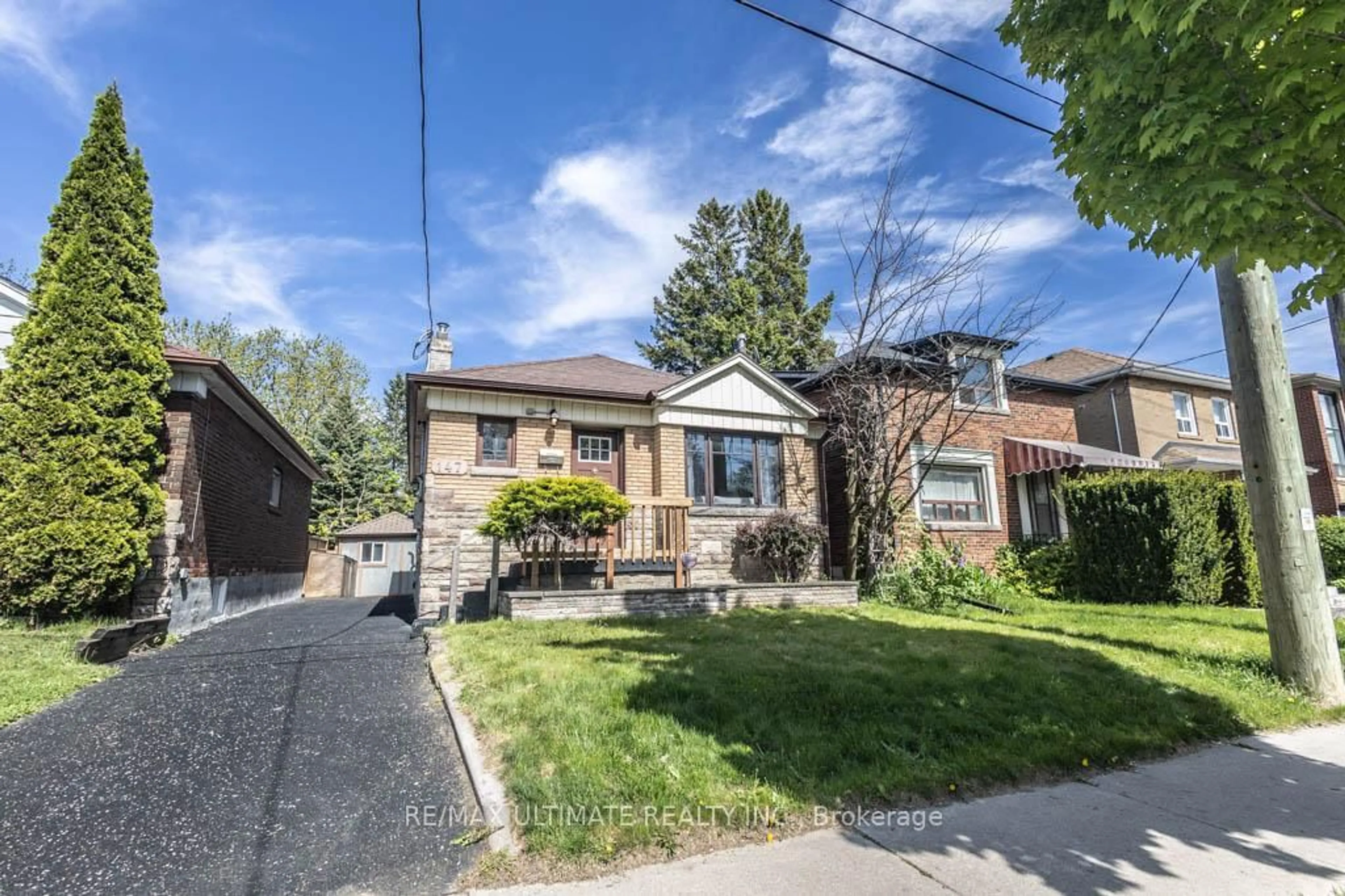 Home with brick exterior material, street for 147 Royal York Dr, Toronto Ontario M8V 2T9
