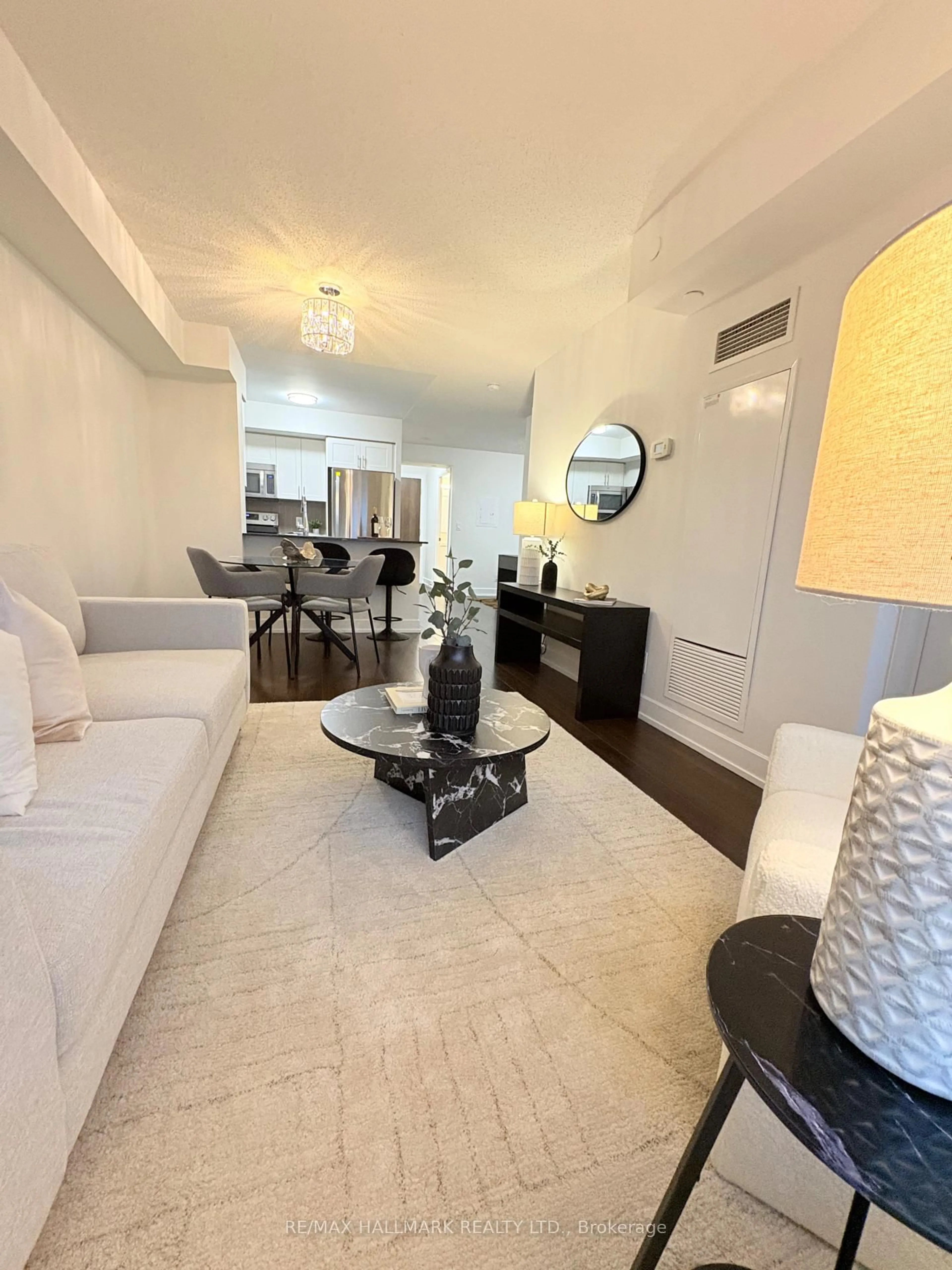 Living room with furniture, unknown for 2 EVA Rd #628, Toronto Ontario M9C 2A8