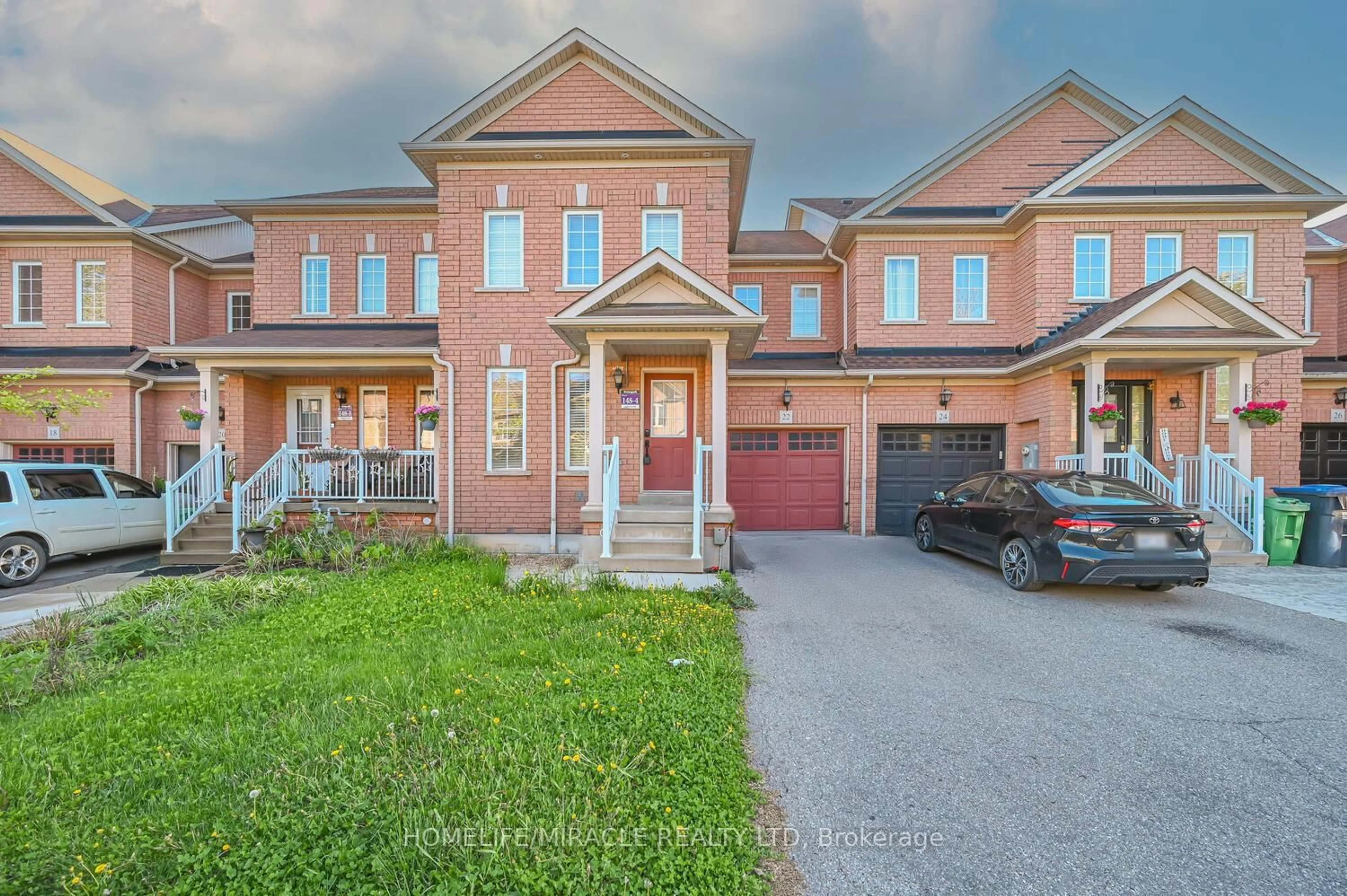 Home with brick exterior material, street for 22 Nutwood Way, Brampton Ontario L6R 0X7