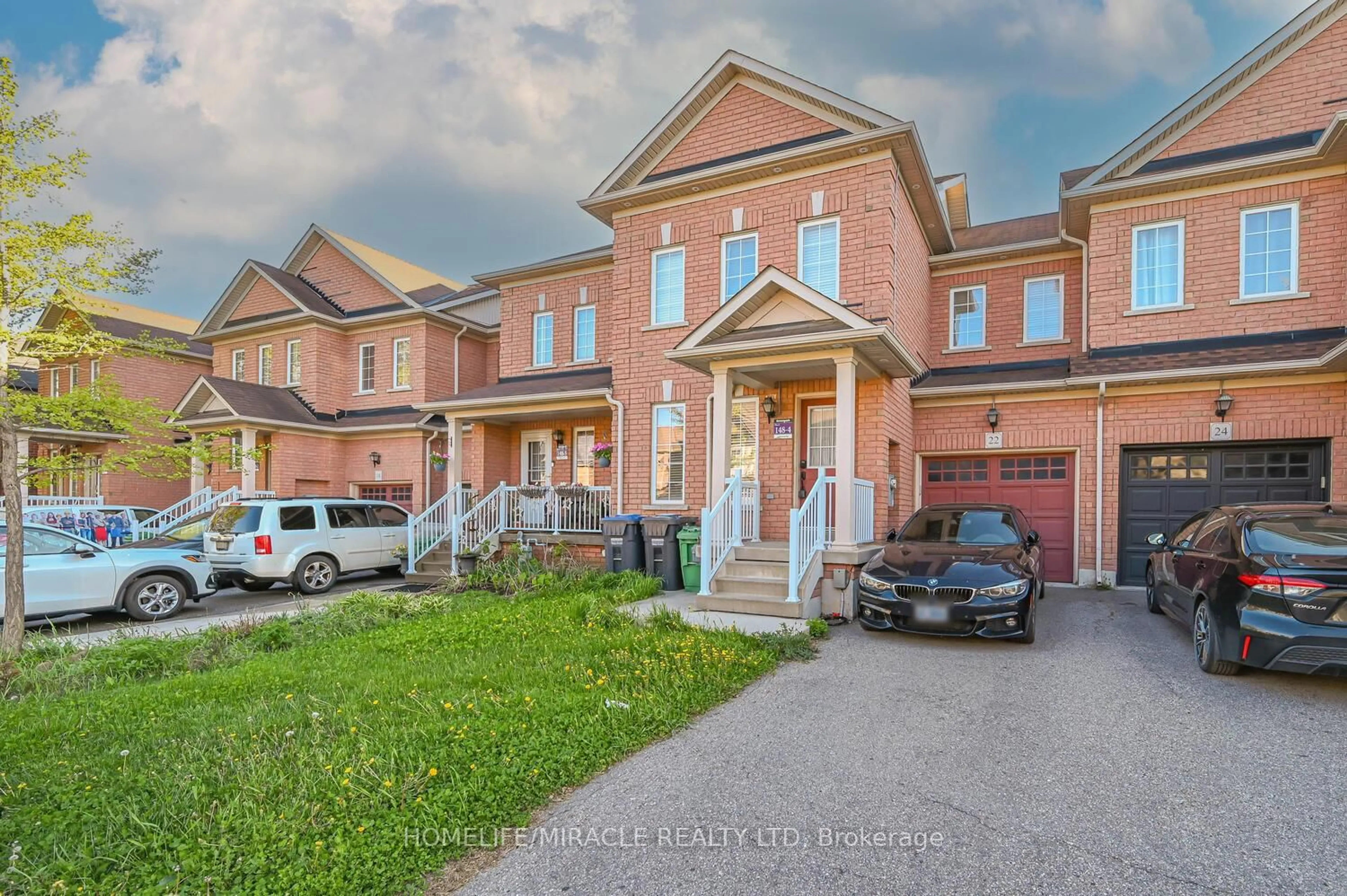 Home with brick exterior material, street for 22 Nutwood Way, Brampton Ontario L6R 0X7