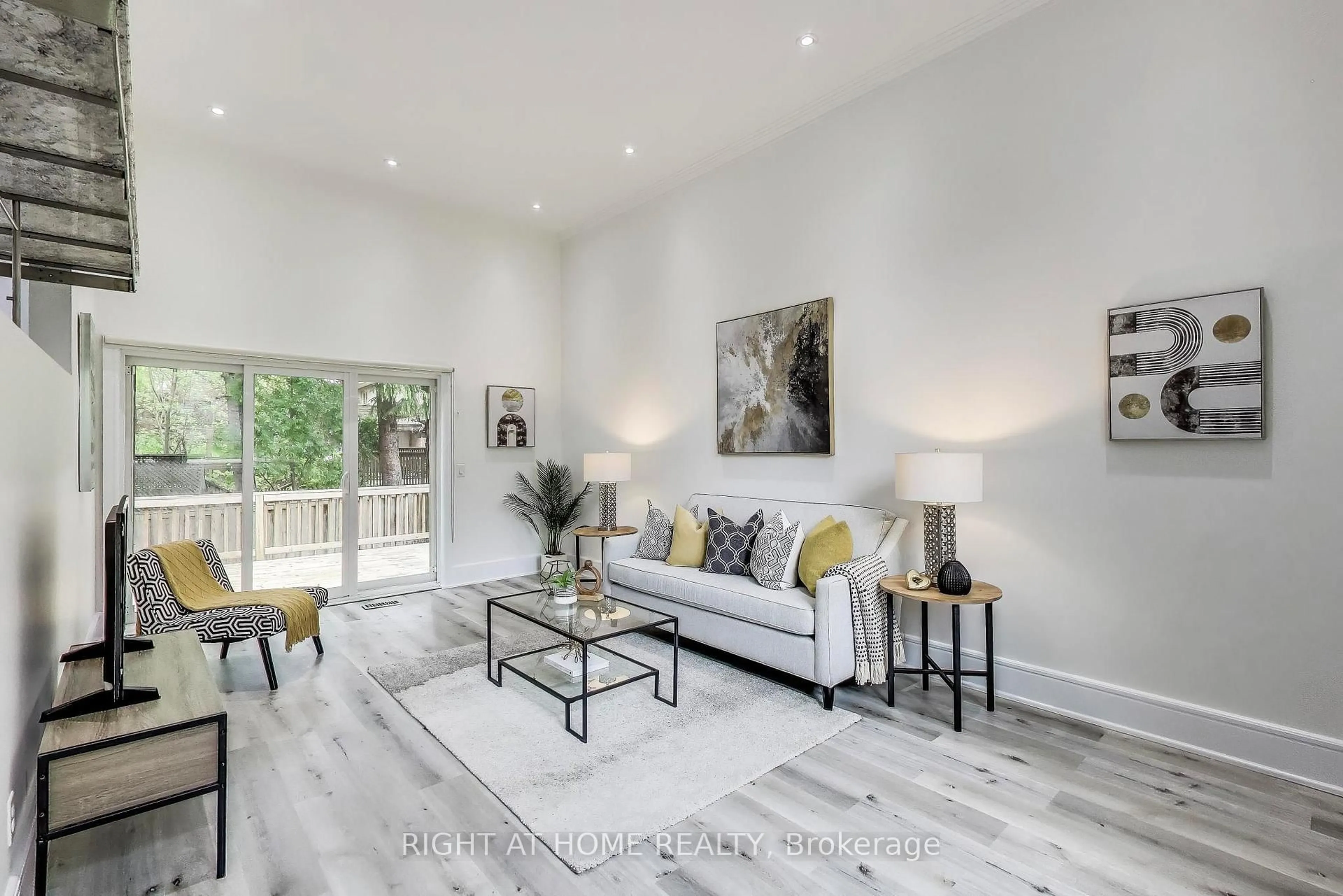 Living room with furniture, wood/laminate floor for 43 Hedges Blvd, Toronto Ontario M9B 3C3