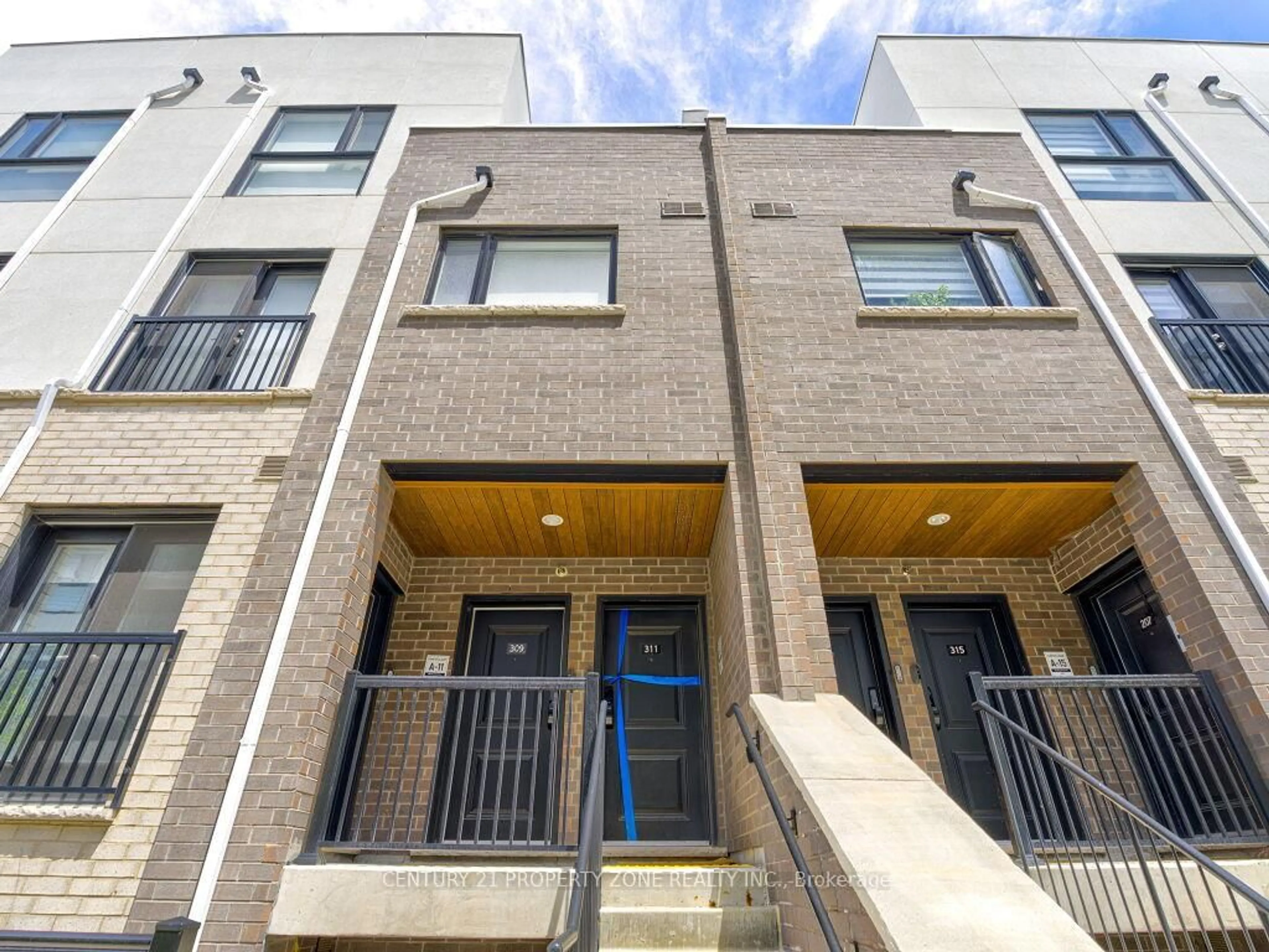 Home with brick exterior material, street for 349 Wheat Boom Dr #311, Oakville Ontario L6H 7X5