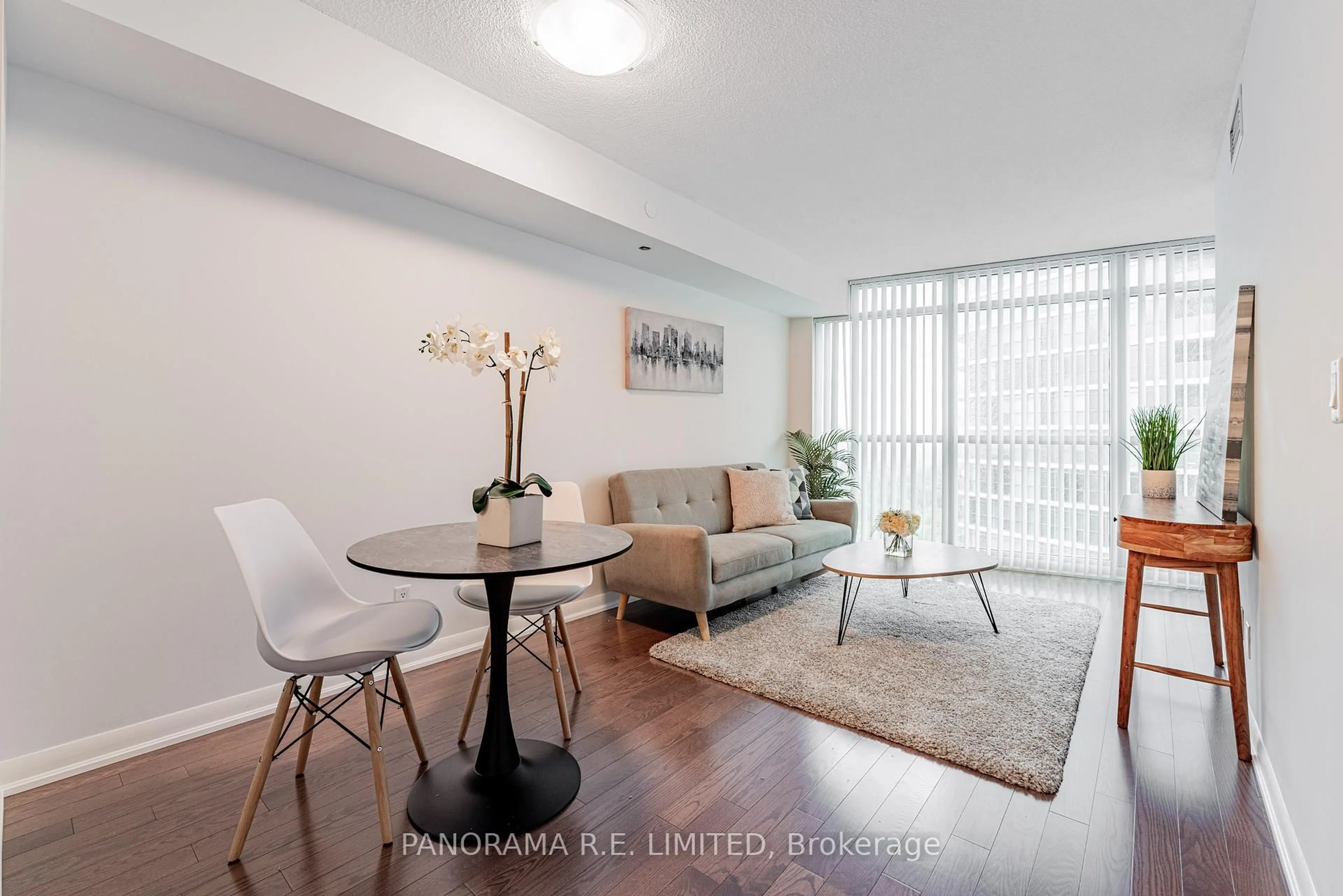 Living room with furniture, wood/laminate floor for 215 Sherway Gardens Rd #1805, Toronto Ontario M9C 0A4