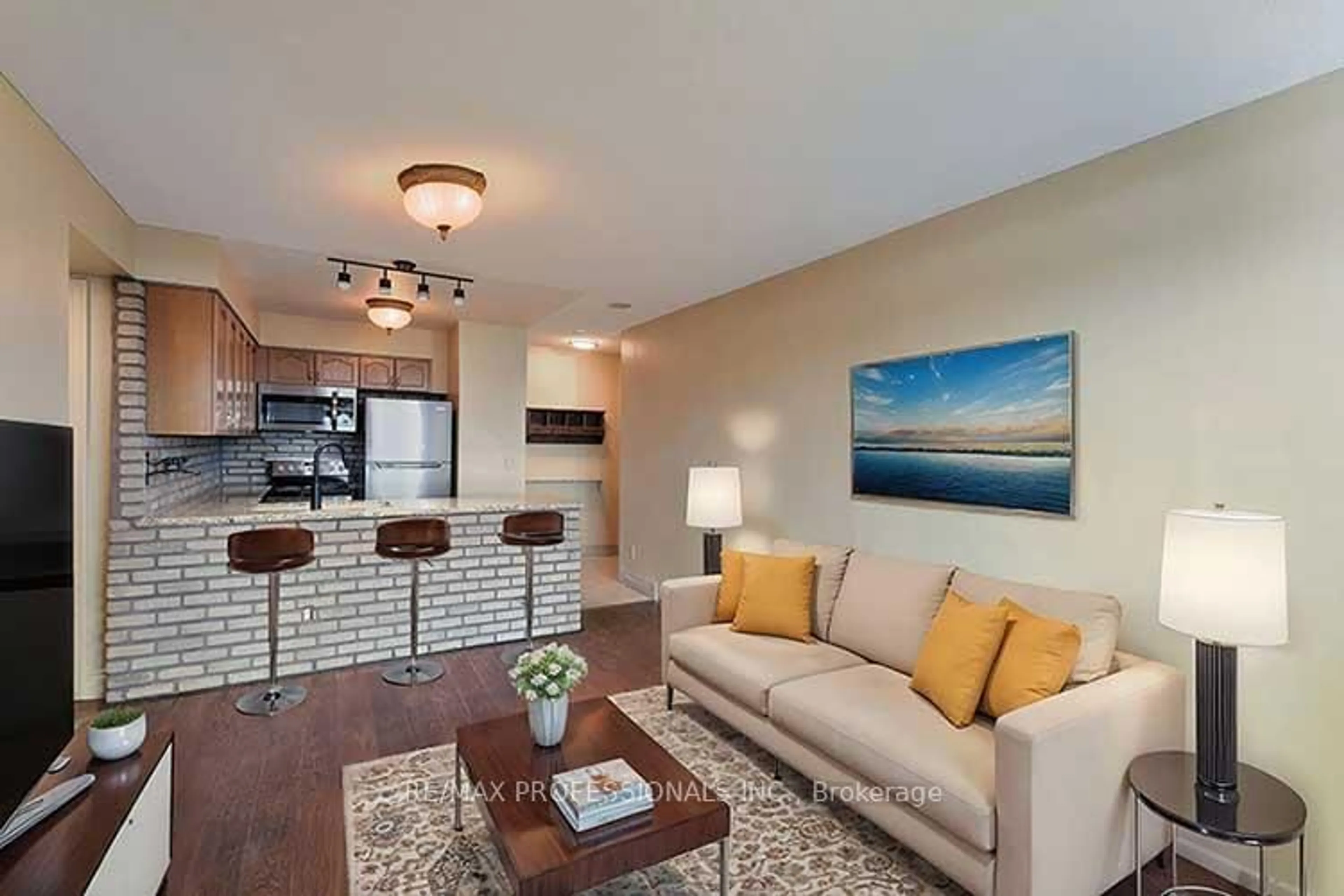 Living room with furniture, wood/laminate floor for 2121 Lake Shore Blvd #1203, Toronto Ontario M8V 4E9