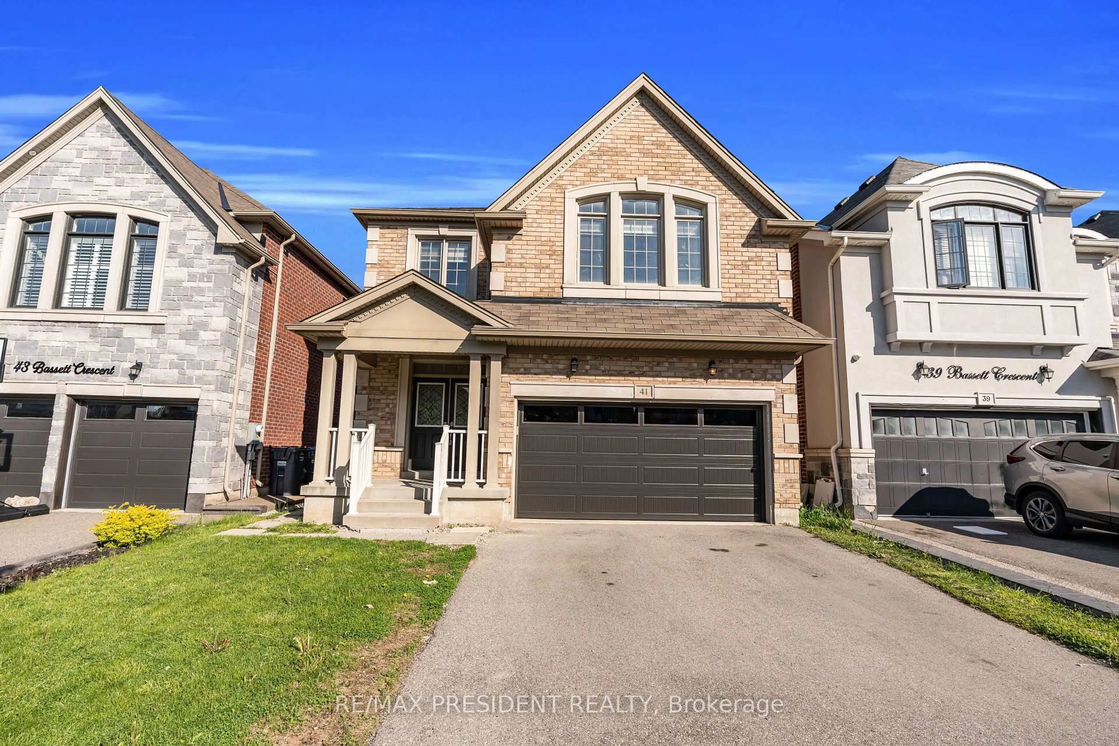 Home with brick exterior material, street for 41 Bassett Cres, Brampton Ontario L6X 5G1