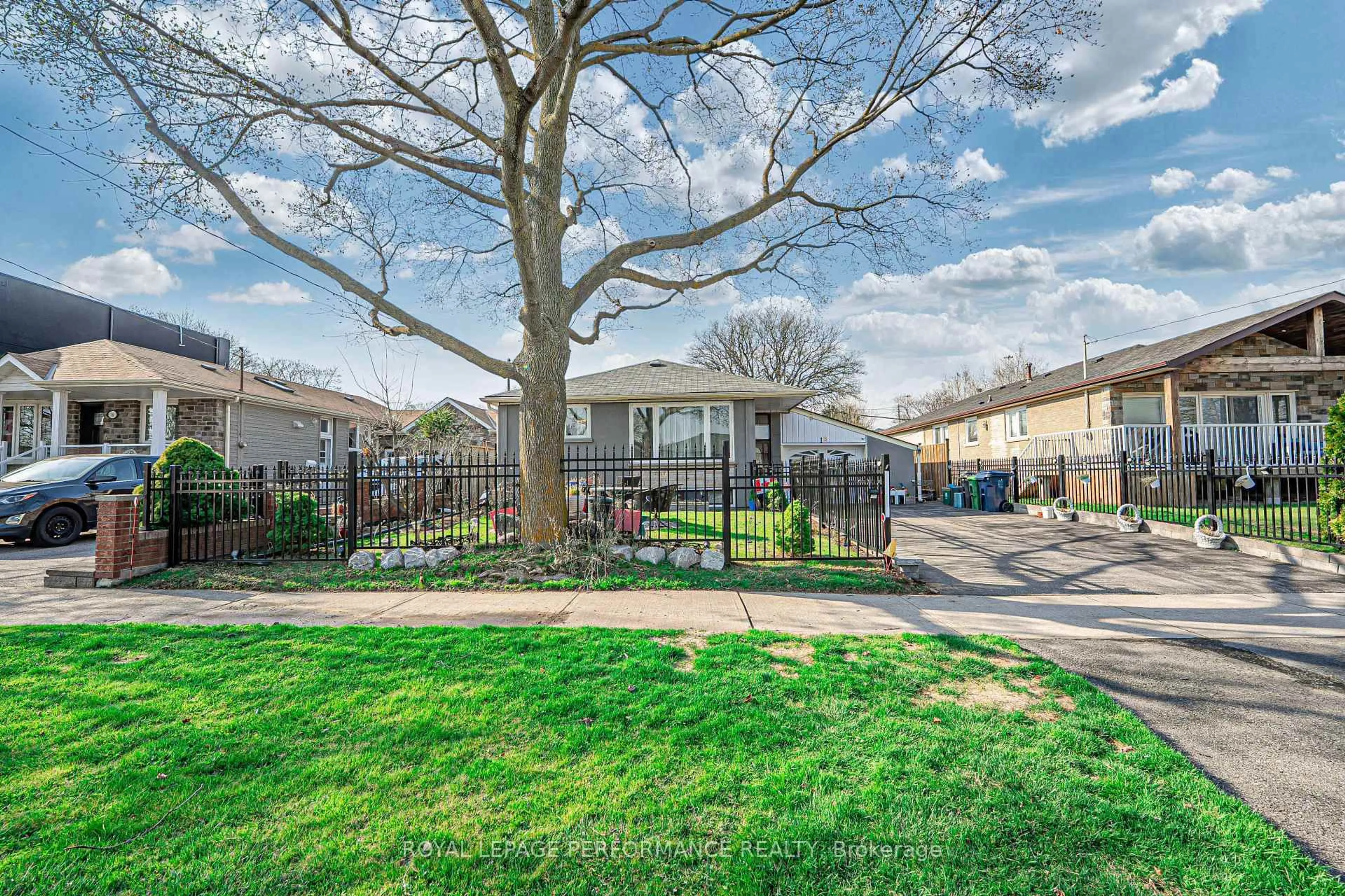 A pic from outside/outdoor area/front of a property/back of a property/a pic from drone, street for 18 Courtwright Rd, Toronto Ontario M9C 4B4