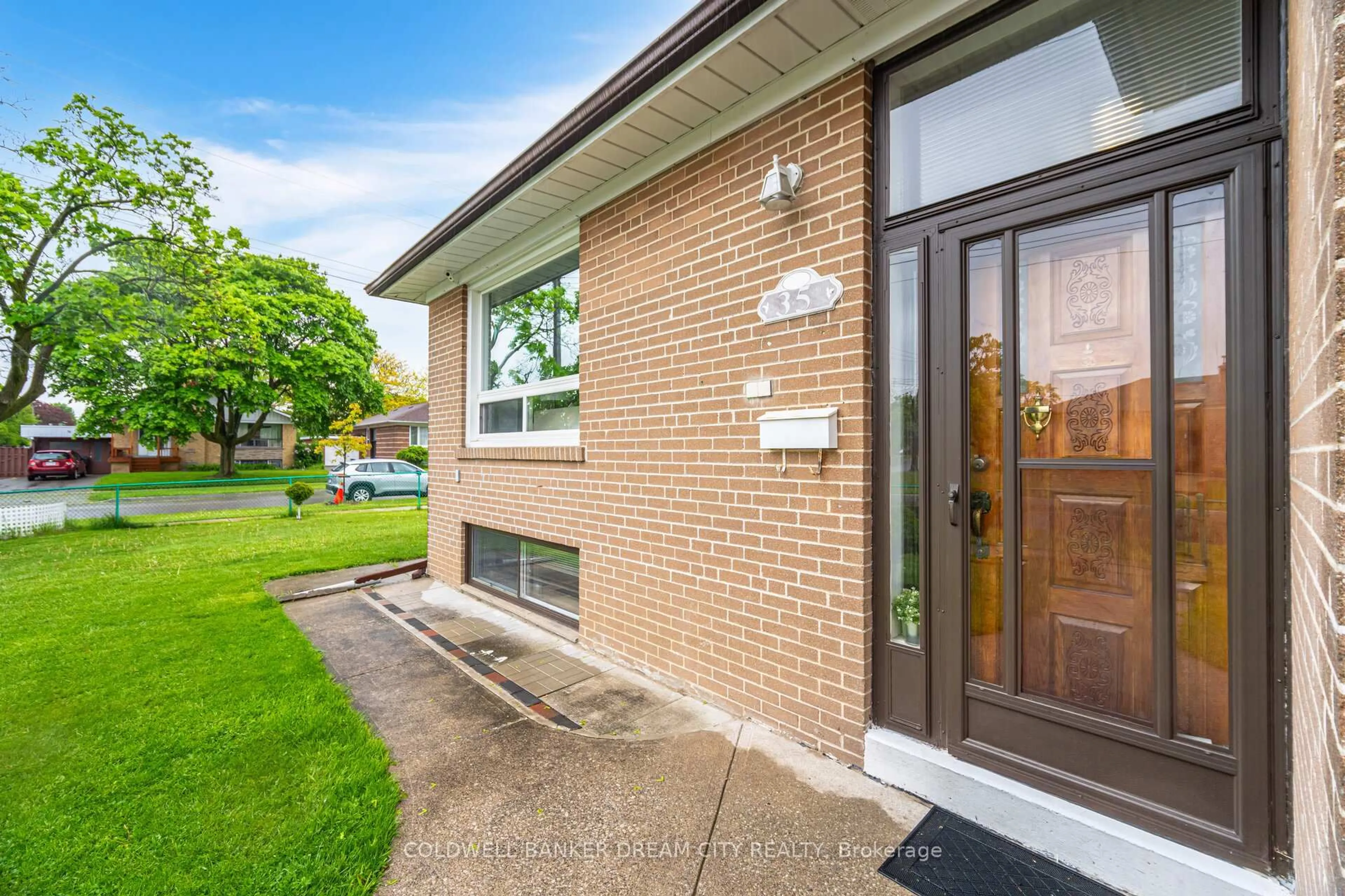 Home with brick exterior material, street for 35 Guiness Ave, Toronto Ontario M9W 3L1