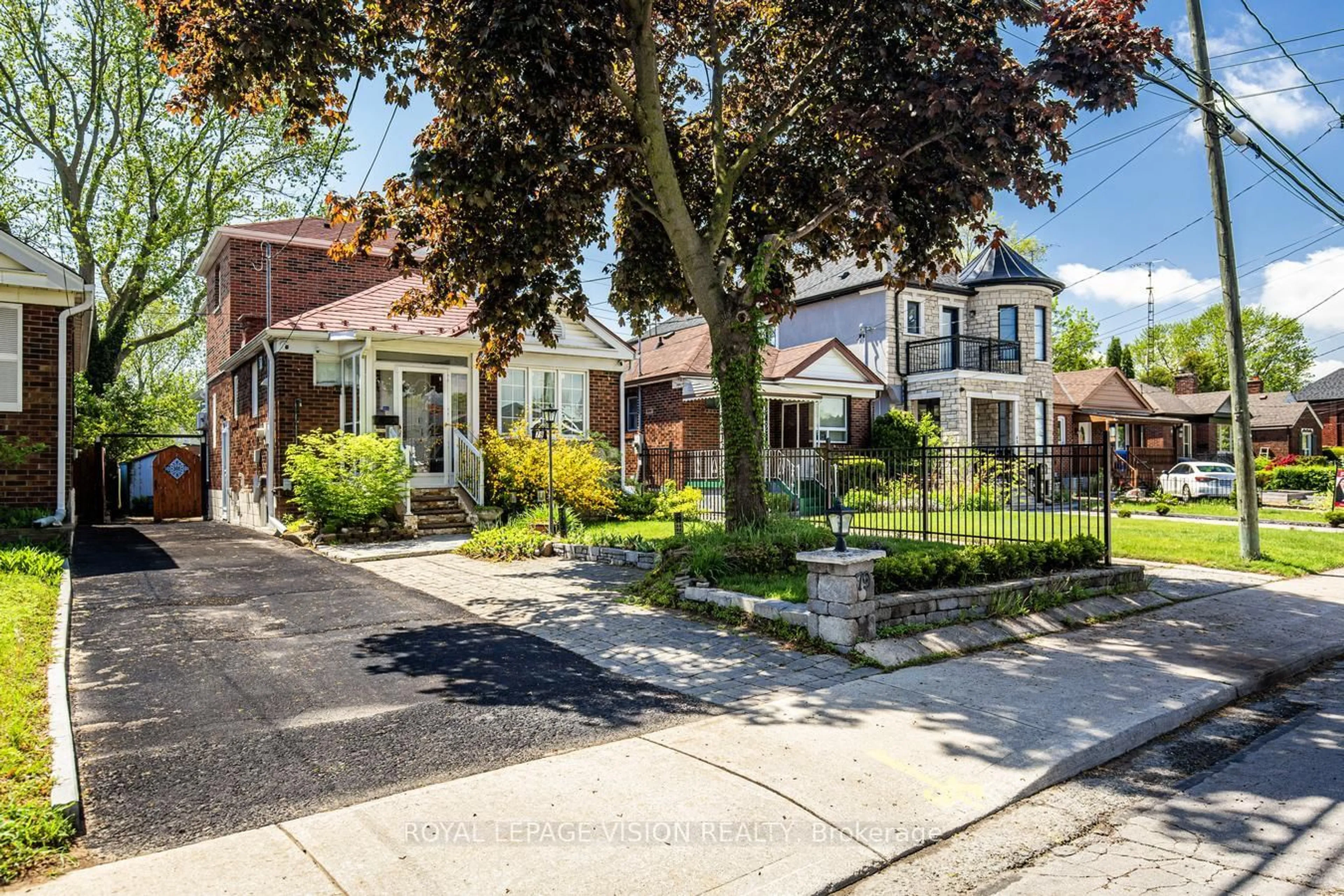 Home with brick exterior material, street for 79 Foxwell St, Toronto Ontario M6N 1Y9