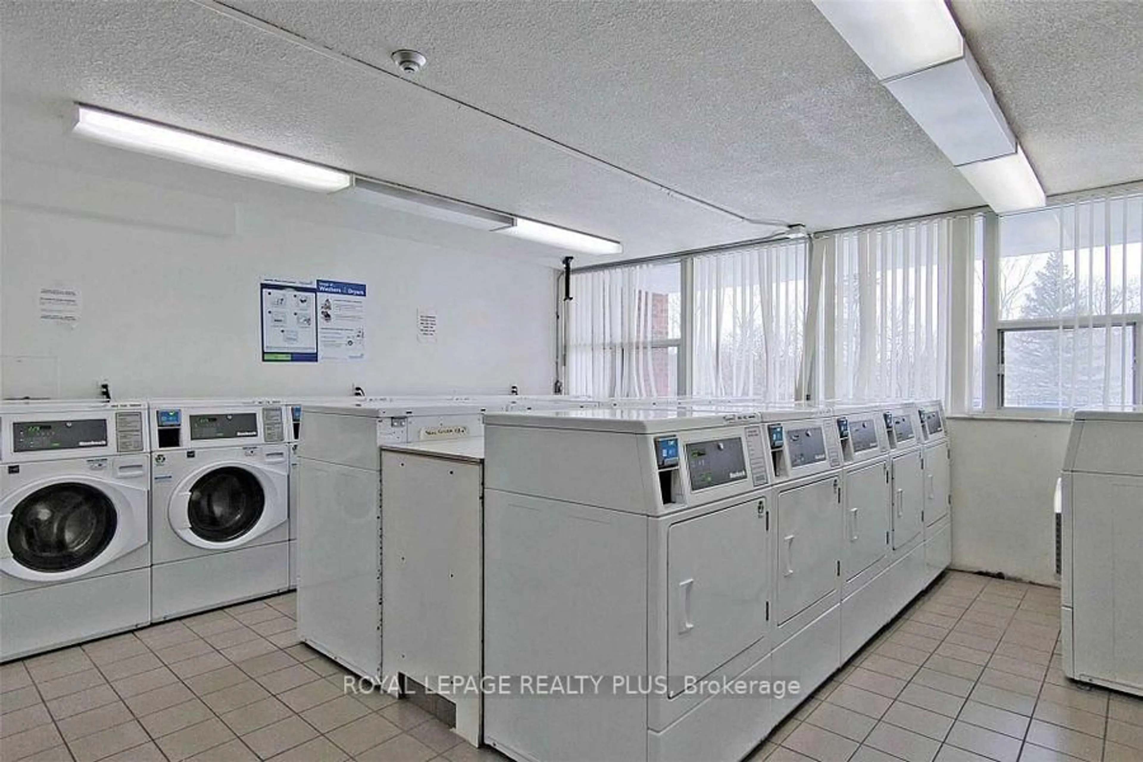 Kitchen with laundary machines, unknown for 3501 Glen Erin Dr #811, Mississauga Ontario L5L 2E9