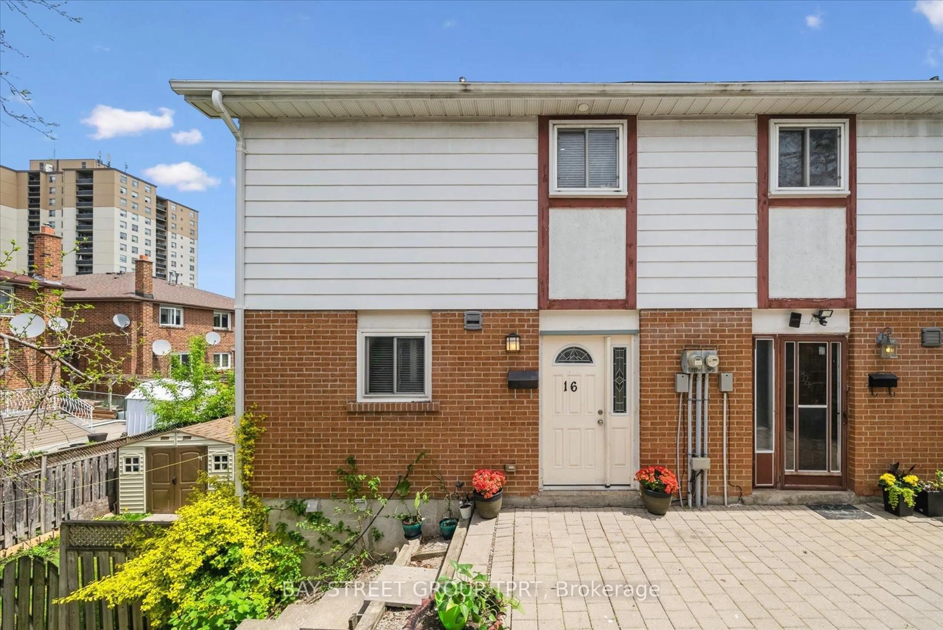 Home with brick exterior material, street for 16 Bur Oak Way, Toronto Ontario M3L 2G4