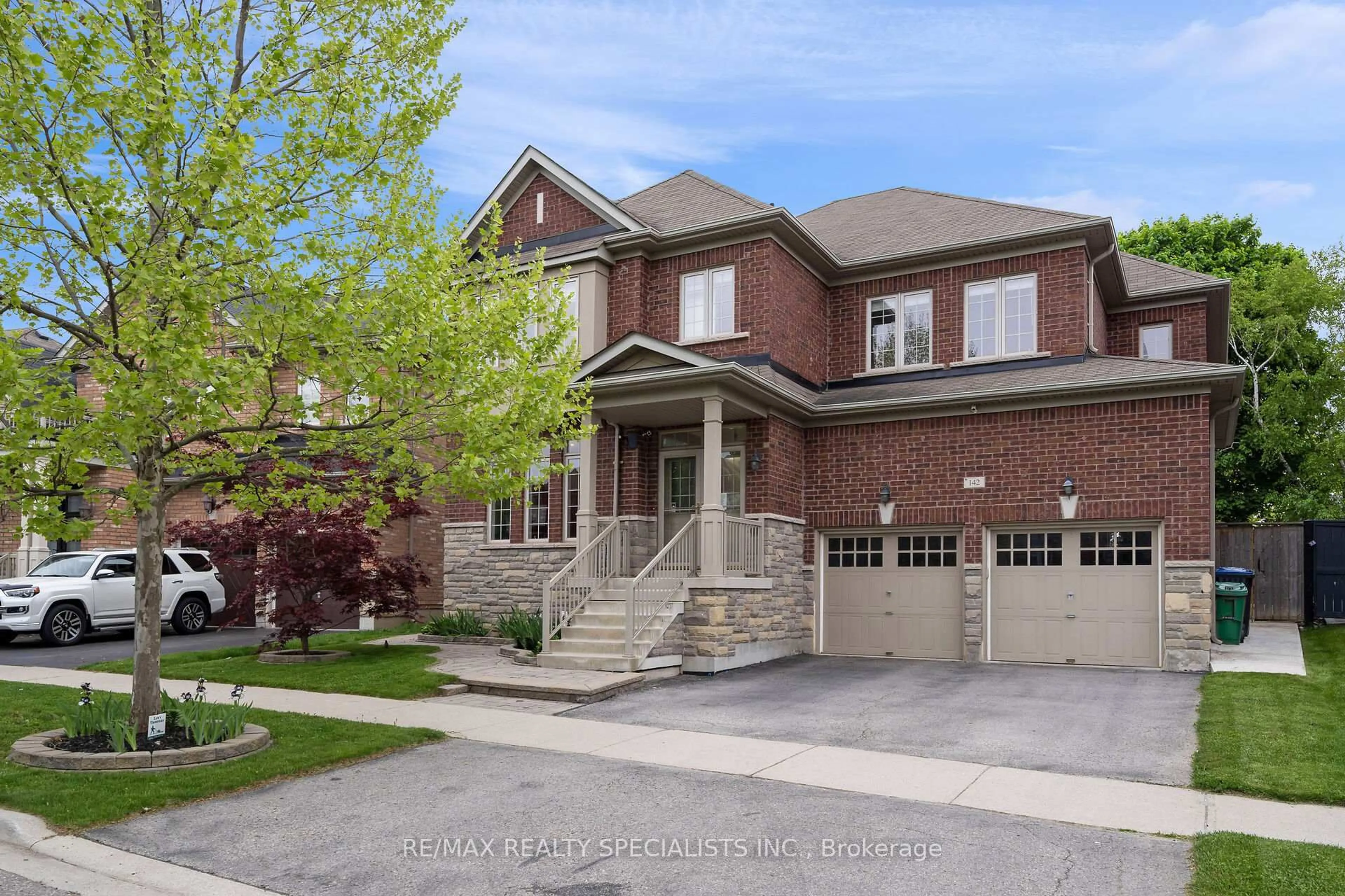 Home with brick exterior material, street for 142 Lloyd Sanderson Dr, Brampton Ontario L7Y 0Z9