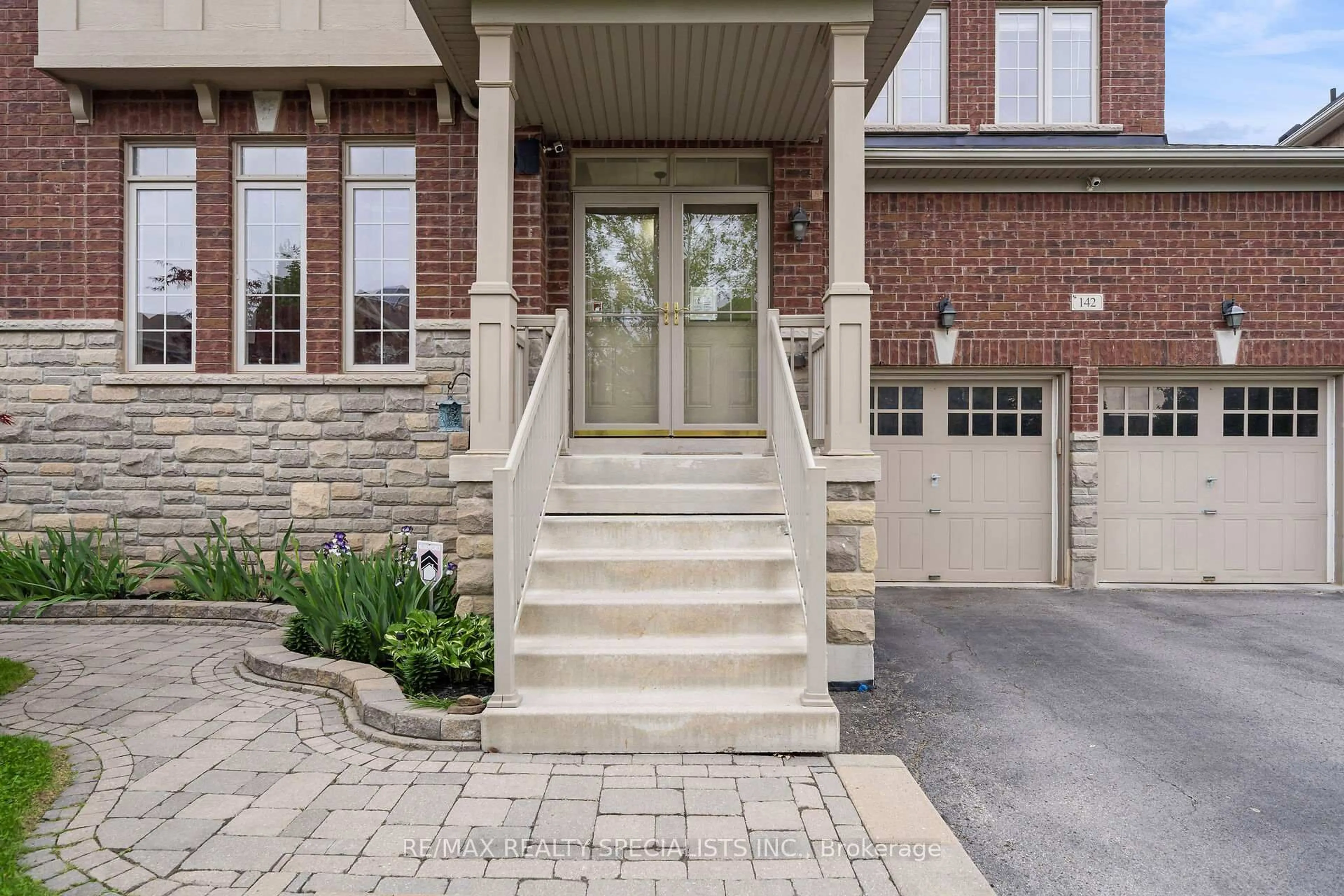 Home with brick exterior material, street for 142 Lloyd Sanderson Dr, Brampton Ontario L7Y 0Z9