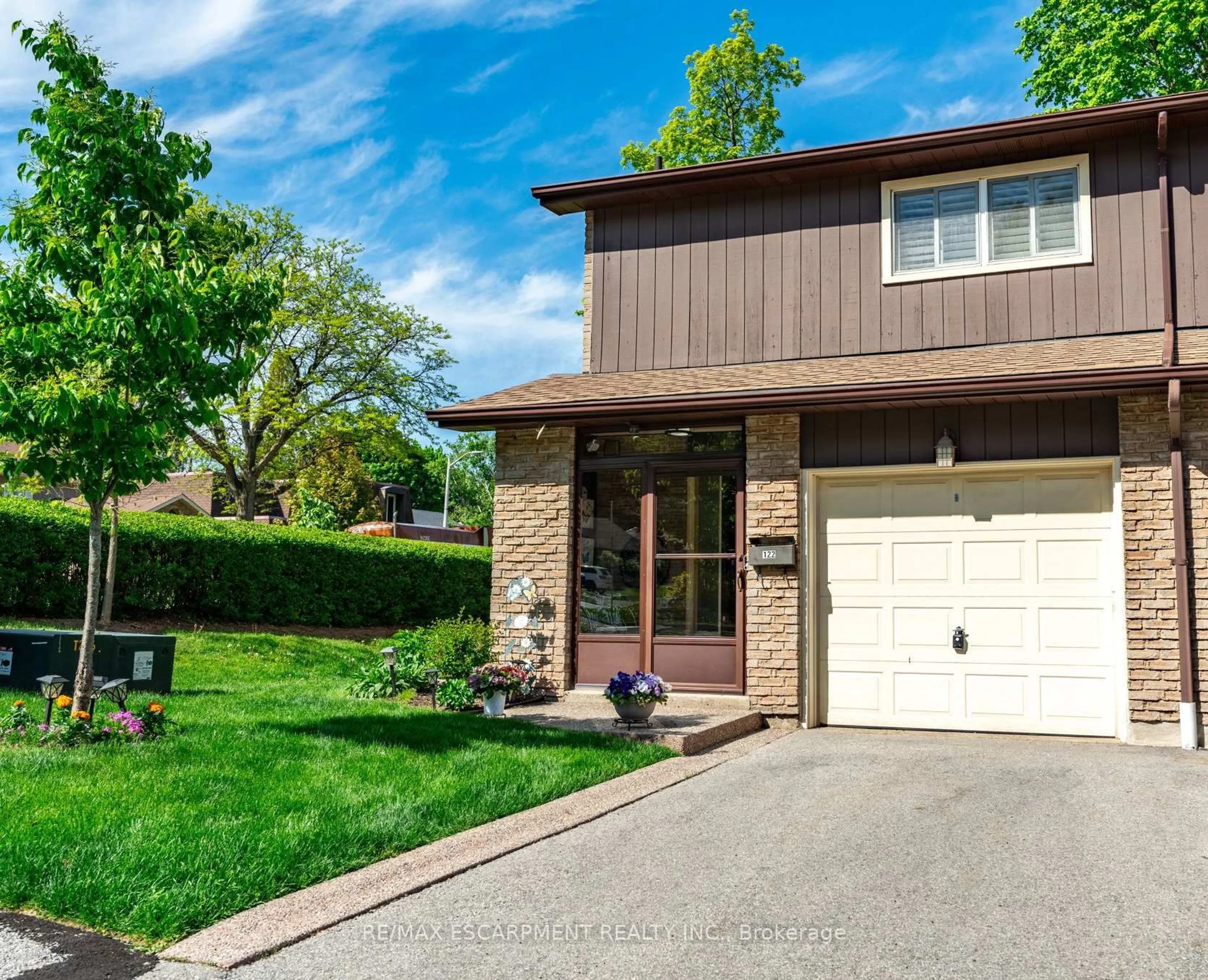 Home with brick exterior material, street for 2301 Cavendish Dr #122, Burlington Ontario L7P 3M3