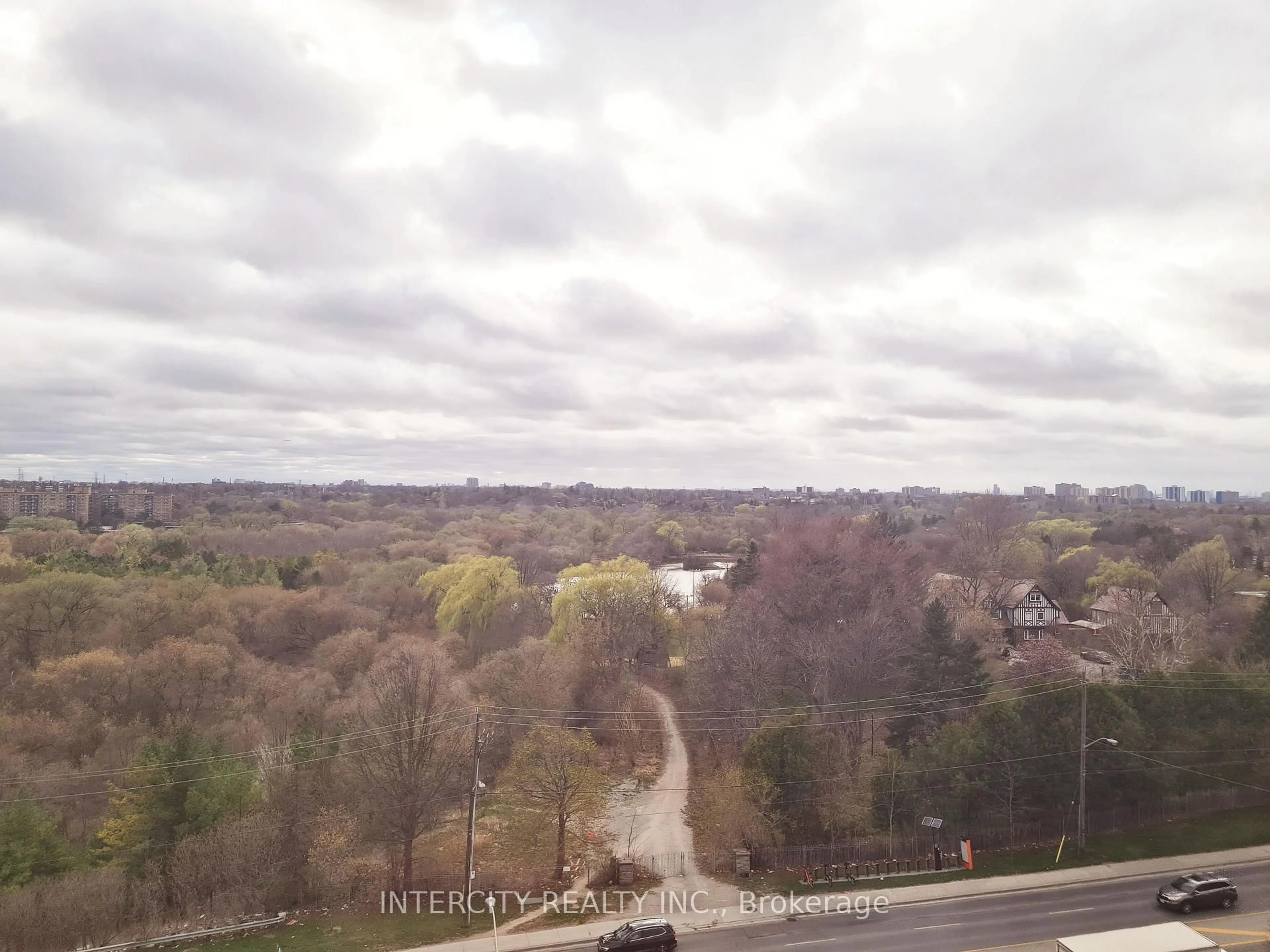 A pic from outside/outdoor area/front of a property/back of a property/a pic from drone, forest/trees view for 3077 Weston Rd #1105, Toronto Ontario M9M 3A1