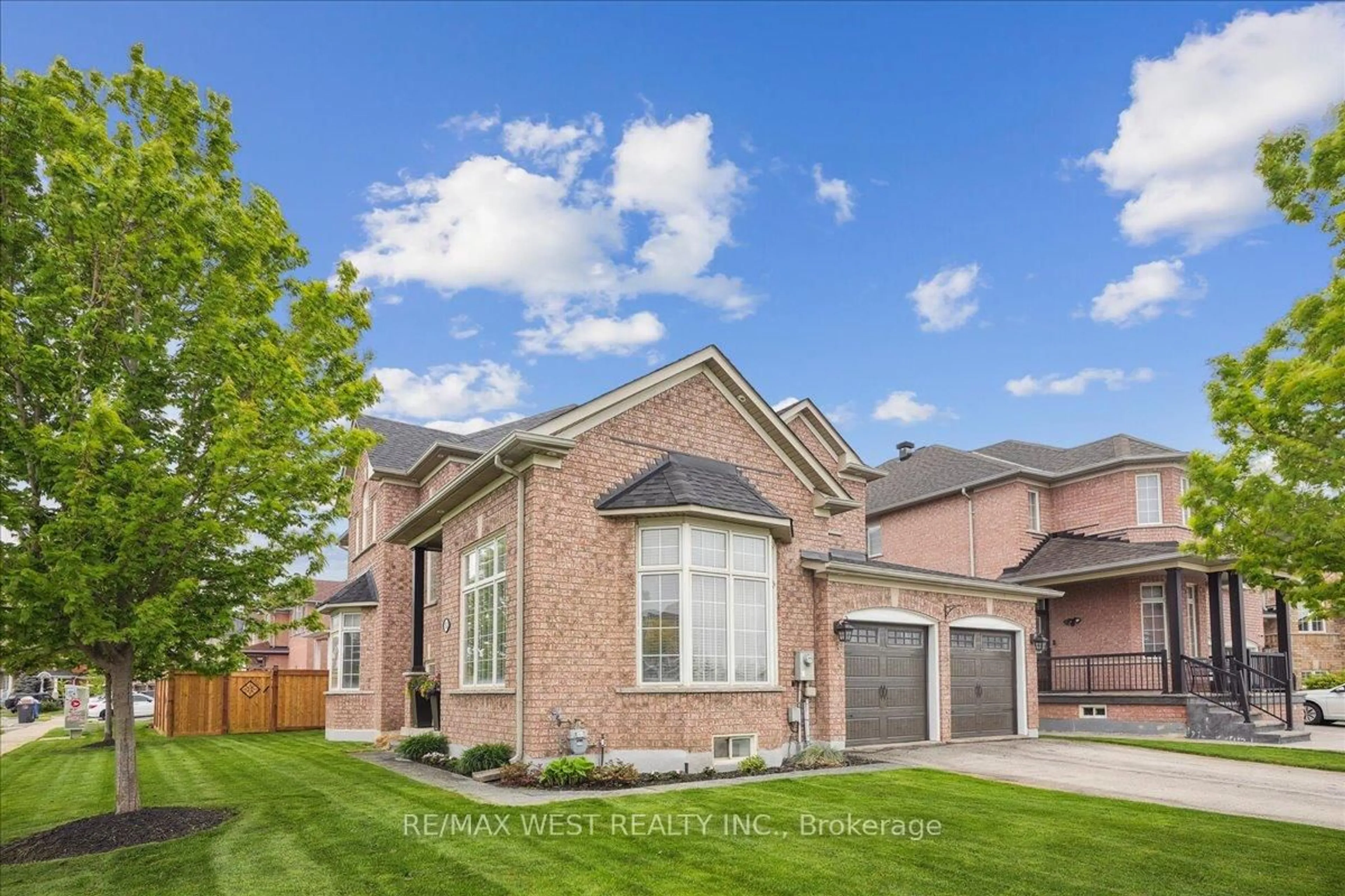 Home with brick exterior material, street for 52 Goreridge Cres, Brampton Ontario L6P 1P1