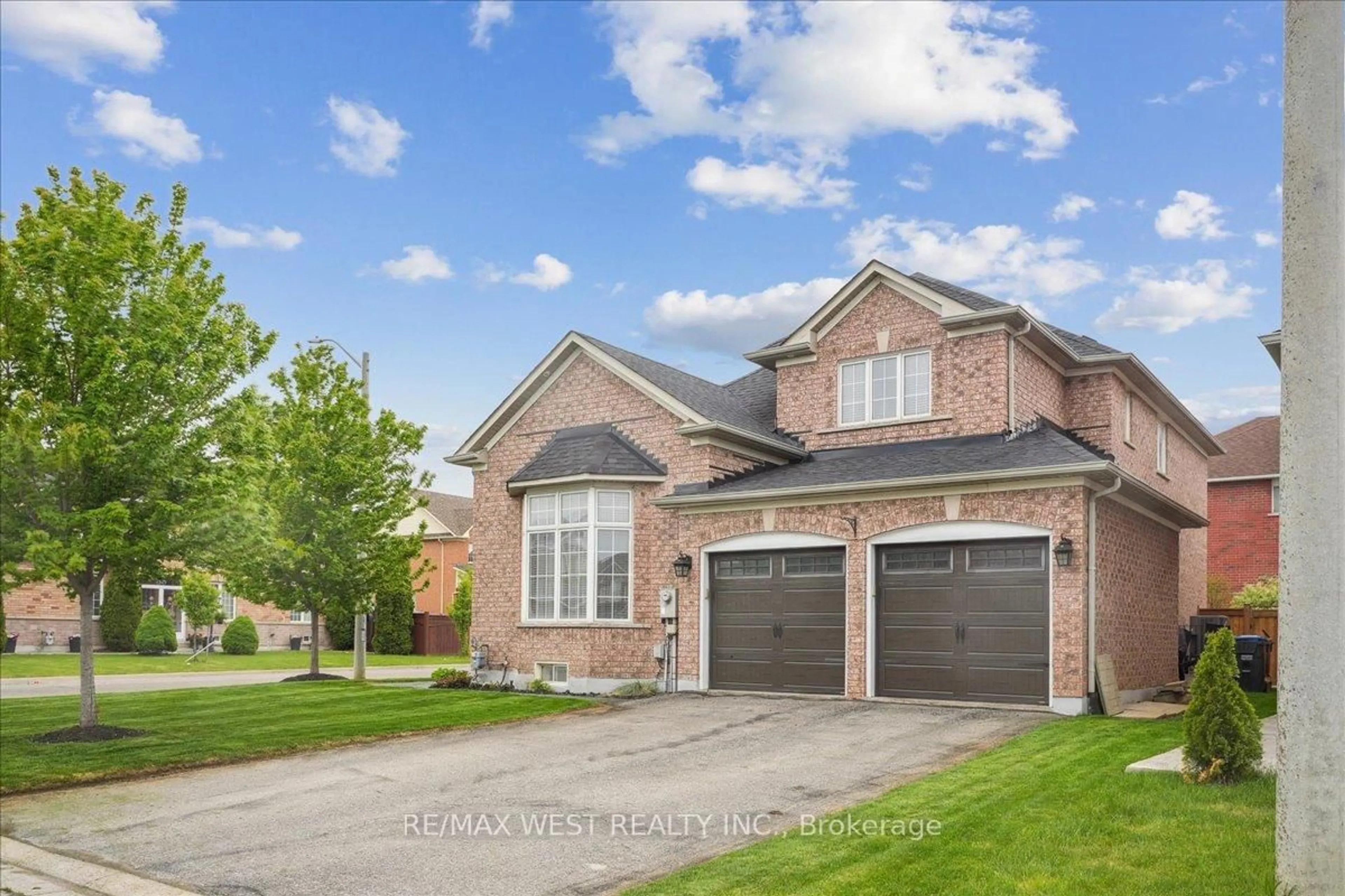 Home with brick exterior material, street for 52 Goreridge Cres, Brampton Ontario L6P 1P1