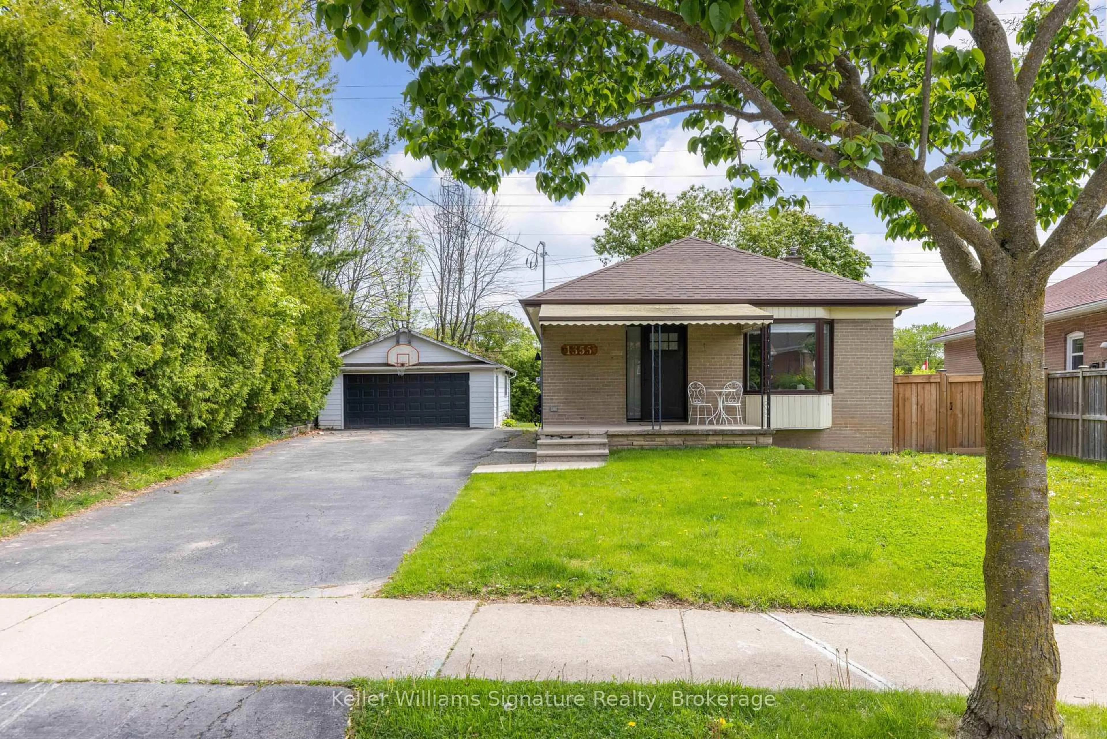 Home with brick exterior material, street for 1355 Augustine Dr, Burlington Ontario L7P 2M9