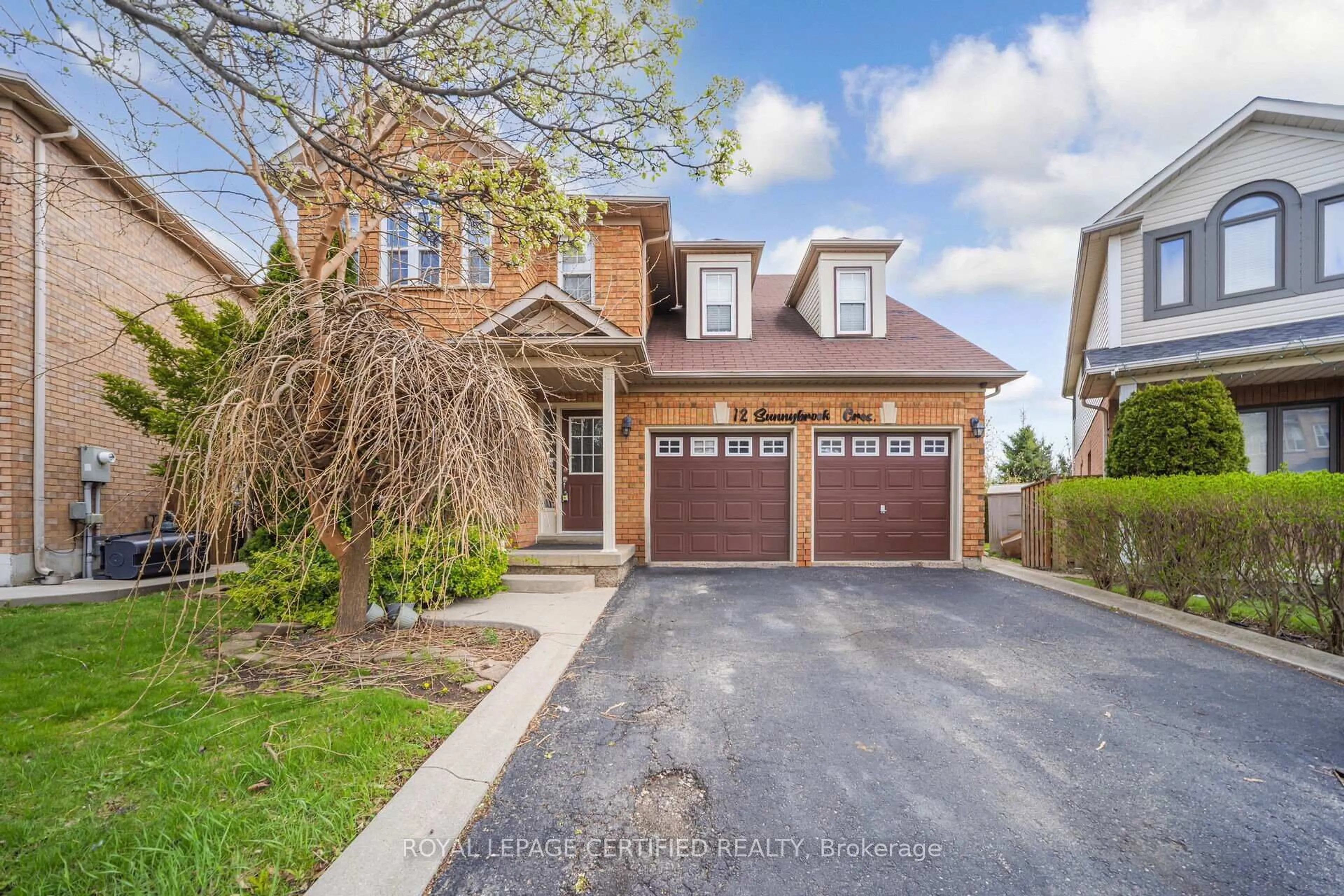 Home with brick exterior material, street for 12 Sunnybrook Cres, Brampton Ontario L7A 1Y2