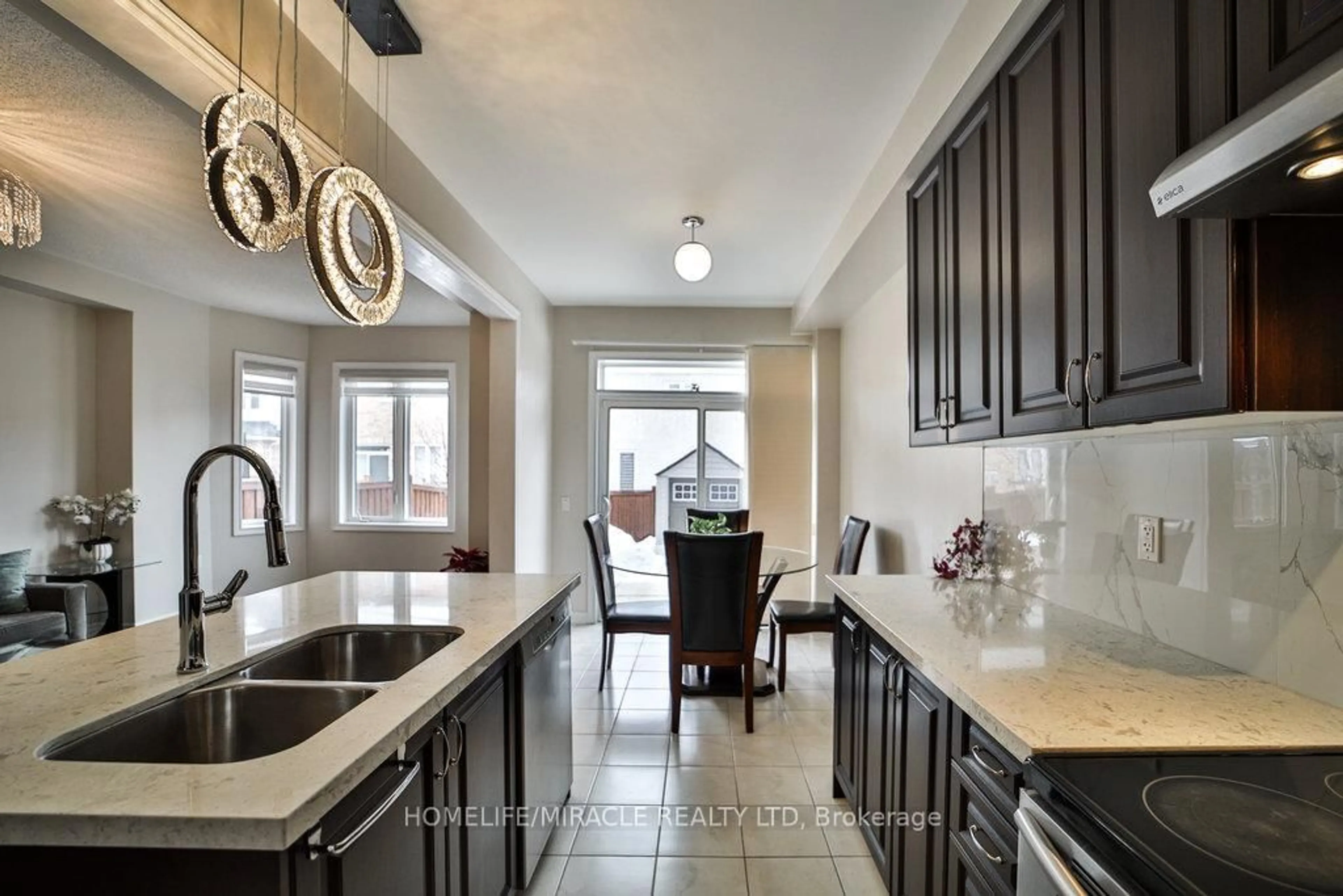 Open concept kitchen, ceramic/tile floor for 24 Deer Ridge Tr, Caledon Ontario L7C 3Z6