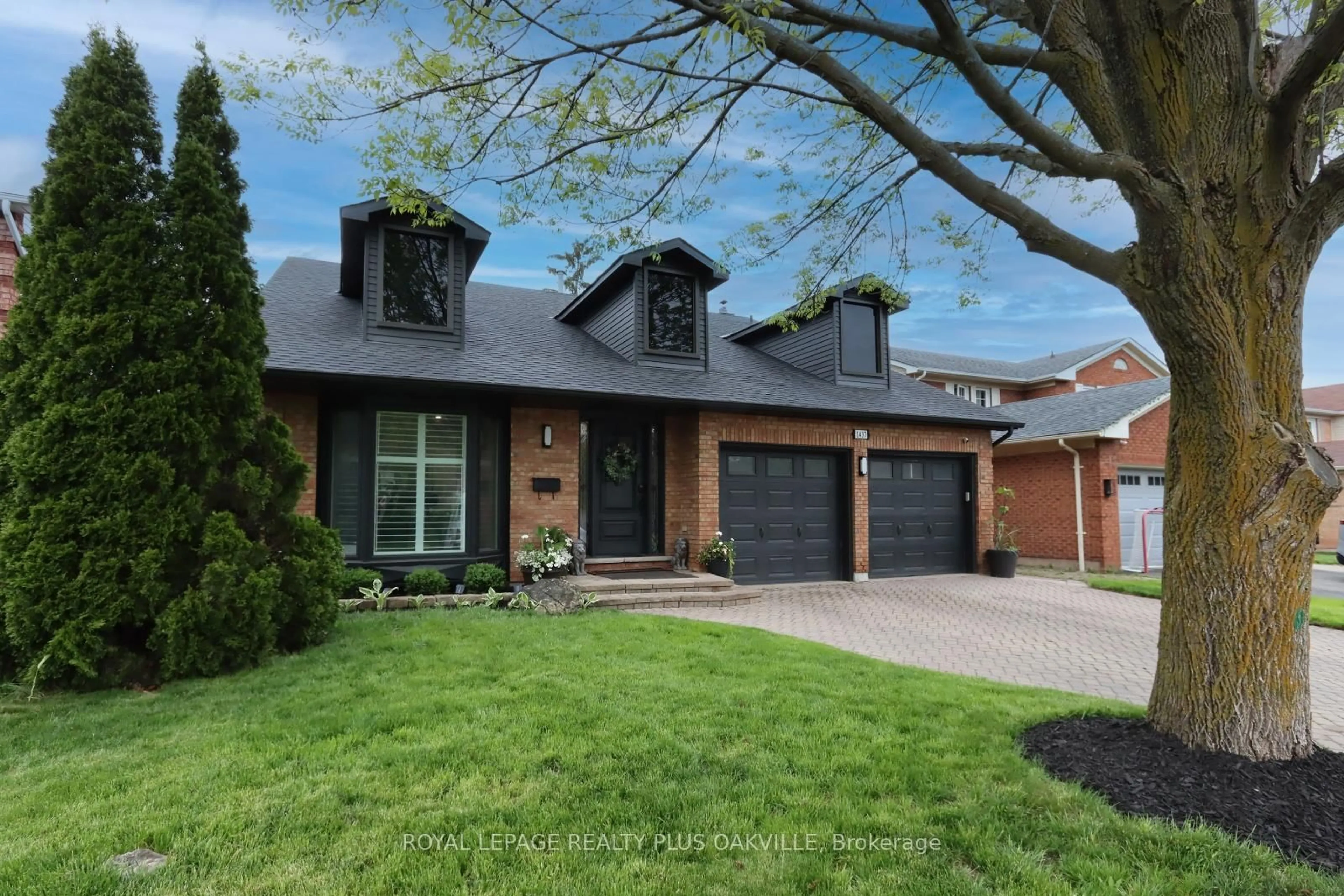 Home with brick exterior material, street for 1437 Thistledown Rd, Oakville Ontario L6M 1Z1