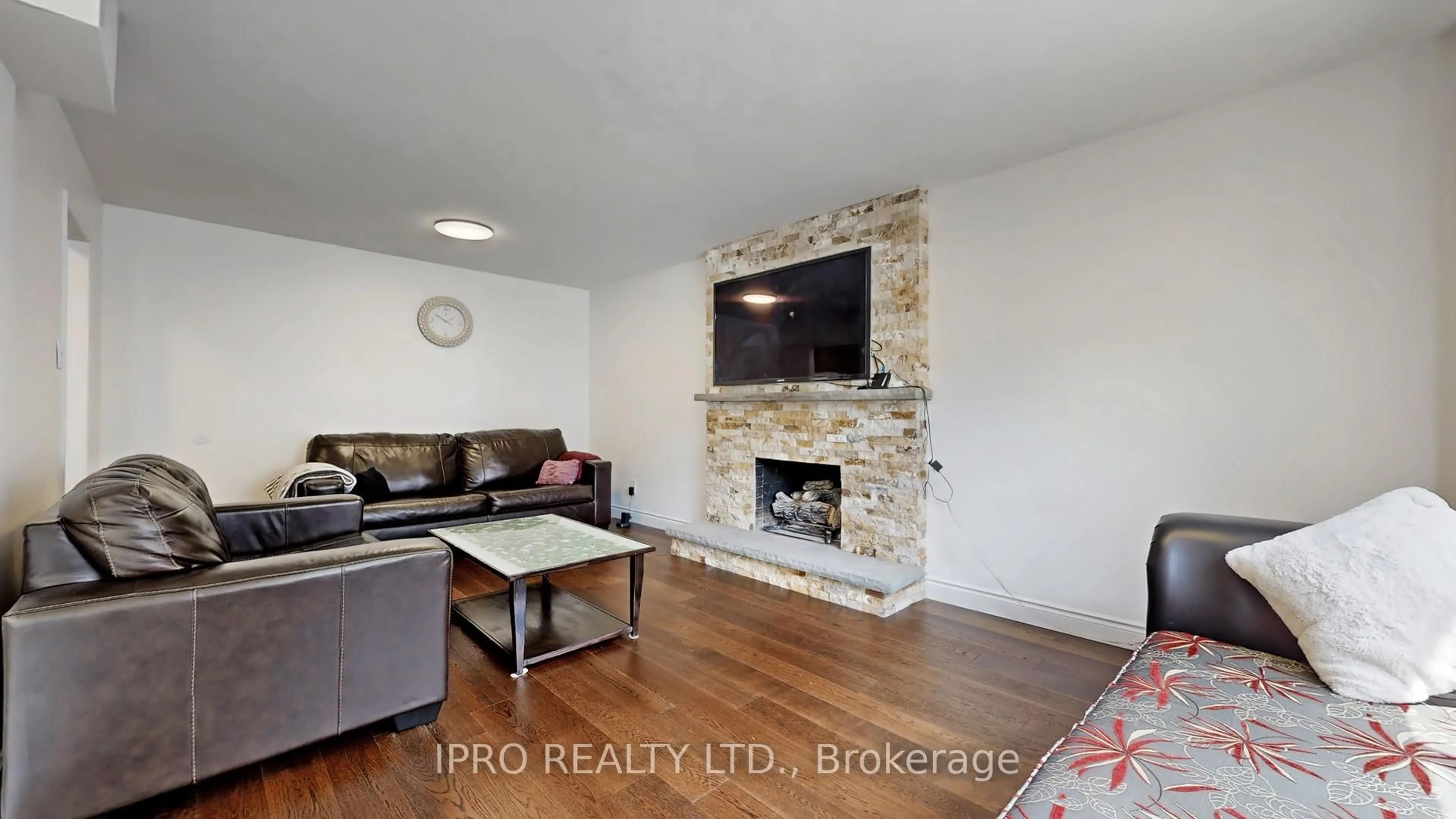 Living room with furniture, wood/laminate floor for 2088 Madden Blvd, Oakville Ontario L6H 3L6