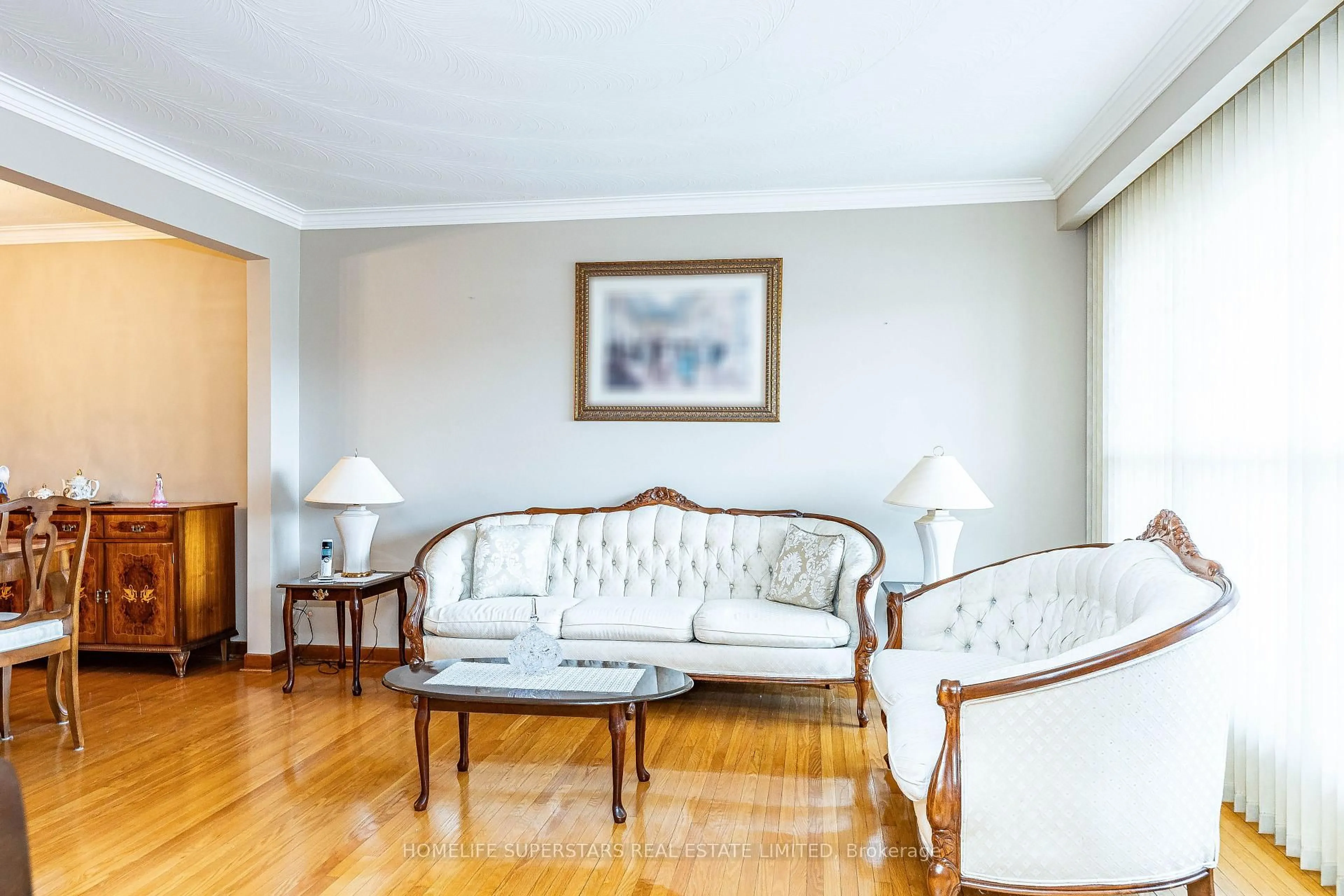 Living room with furniture, wood/laminate floor for 7 Benrubin Dr, Toronto Ontario M9L 2H3