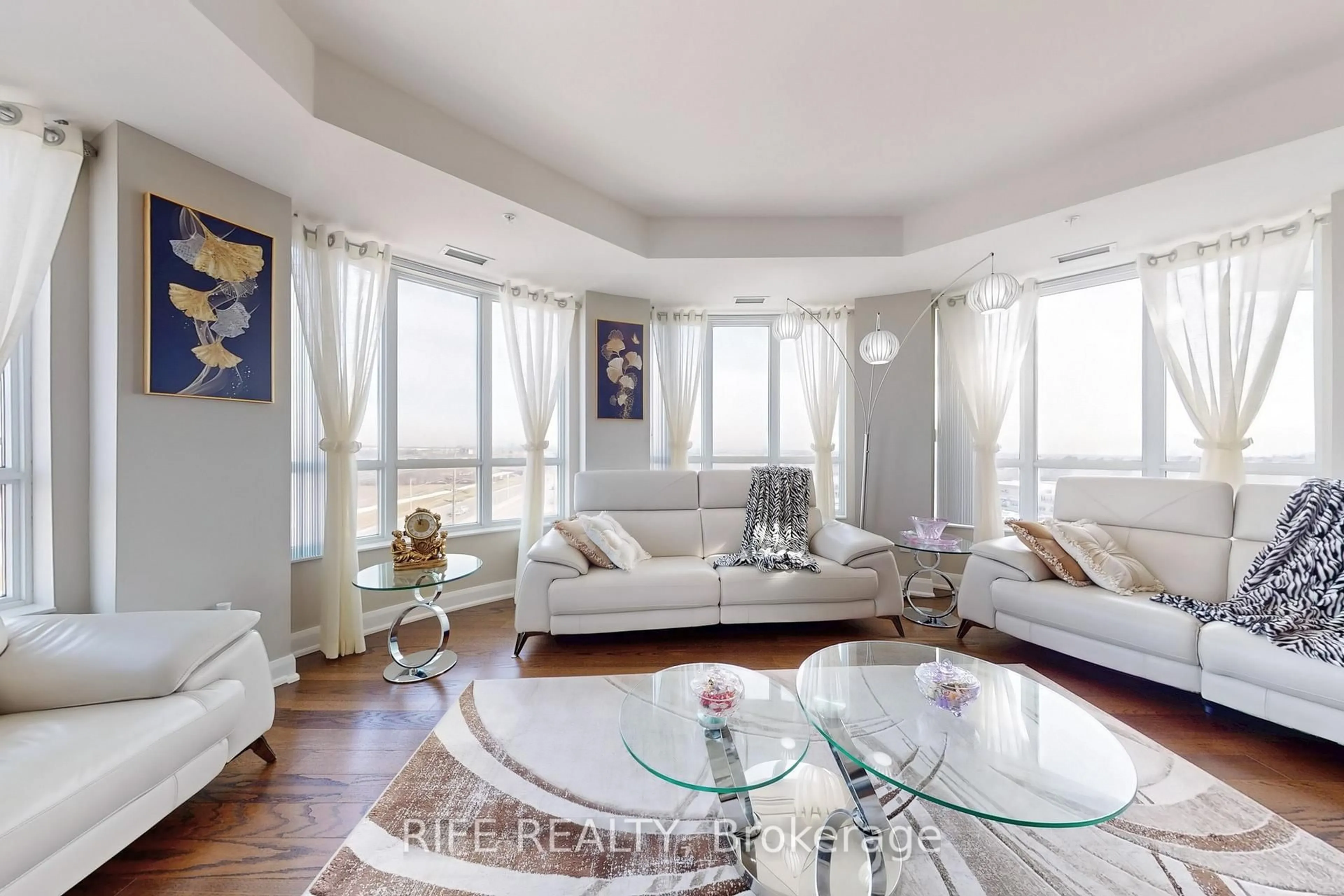Living room with furniture, unknown for 2480 Prince Michael Dr #621, Oakville Ontario L6H 0E9