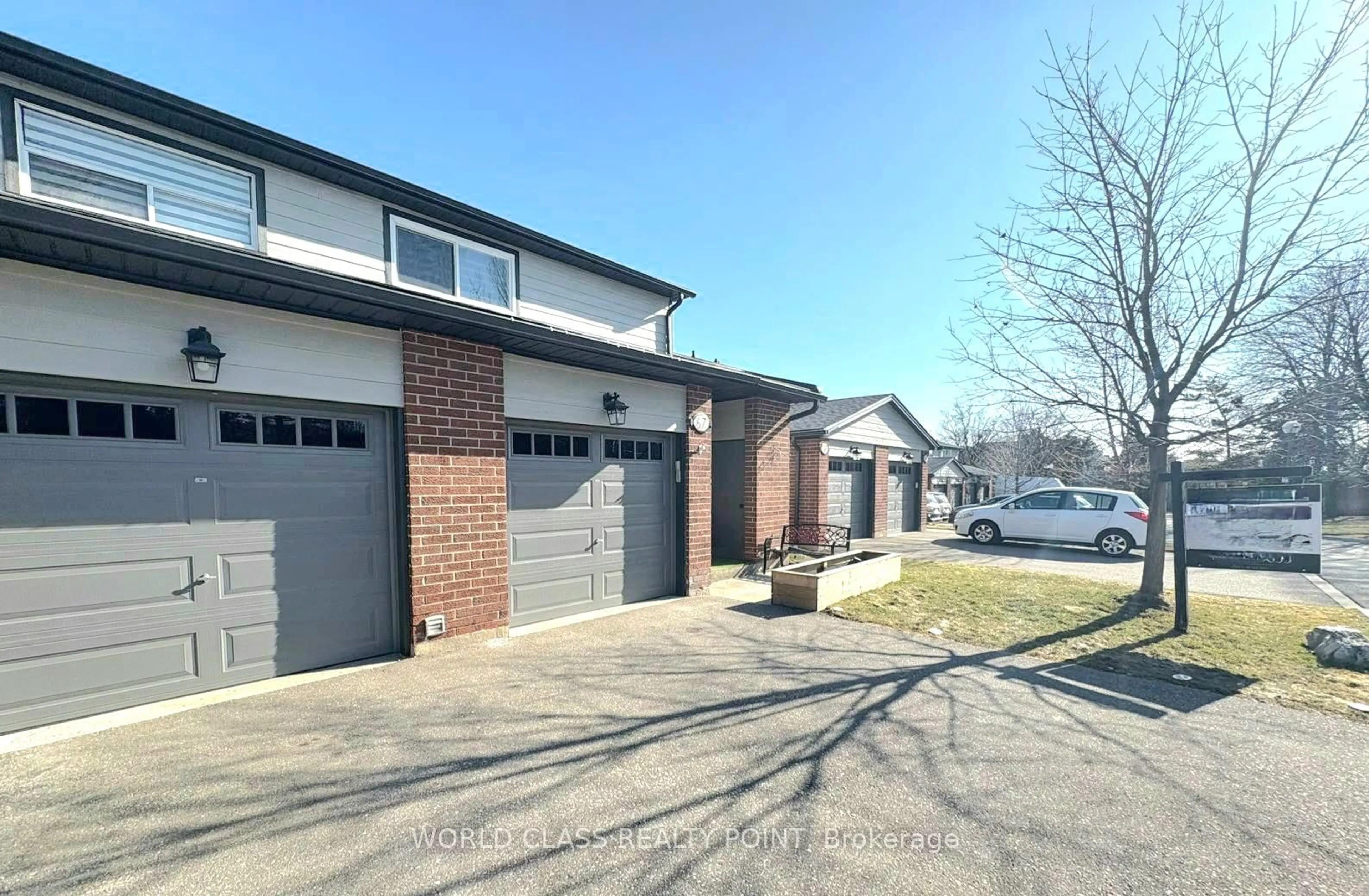 Home with brick exterior material, street for 525 Meadows Blvd #67, Mississauga Ontario L4Z 1H2