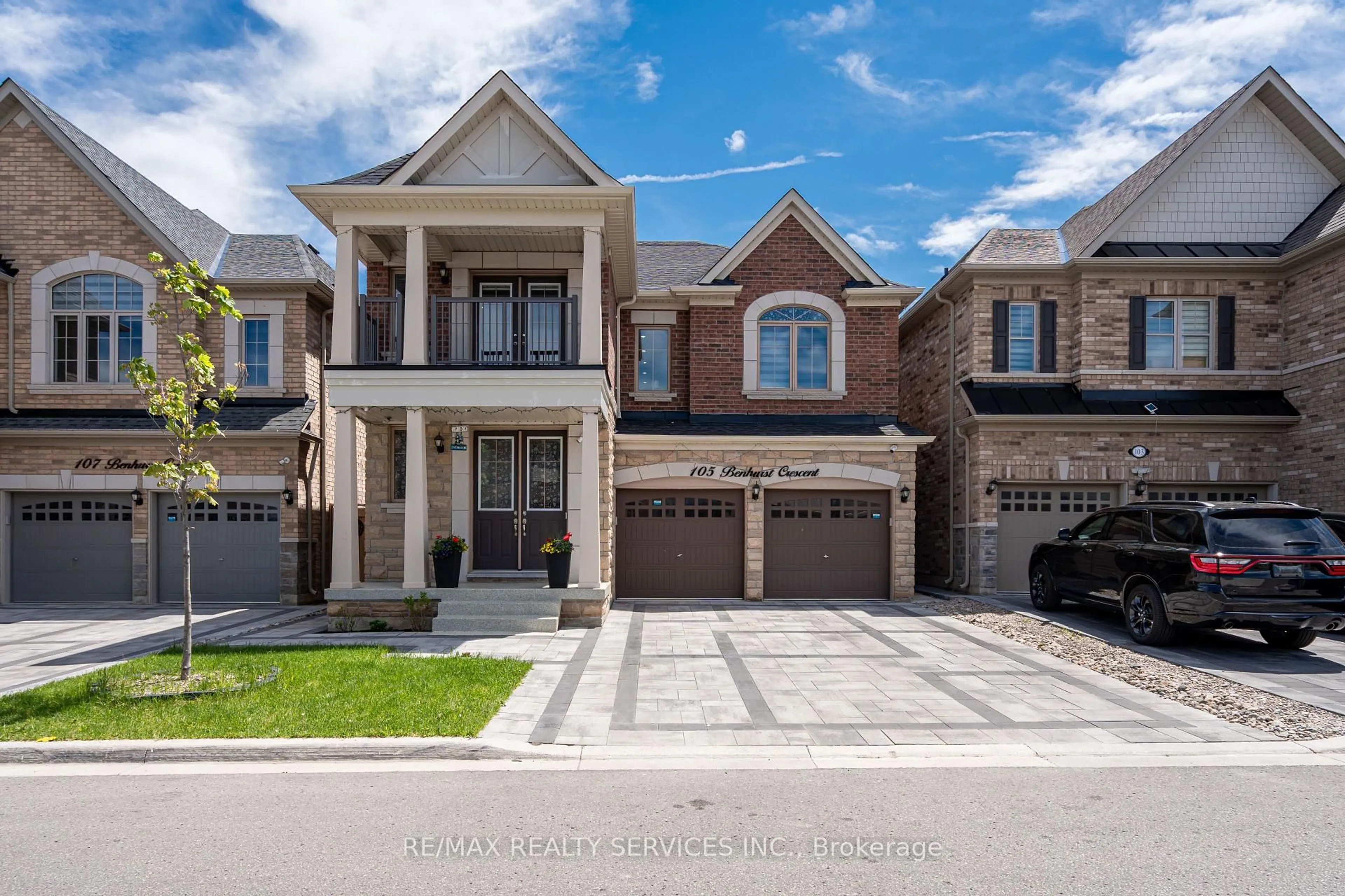 Home with brick exterior material, street for 105 Benhurst Cres, Brampton Ontario L7A 5A4