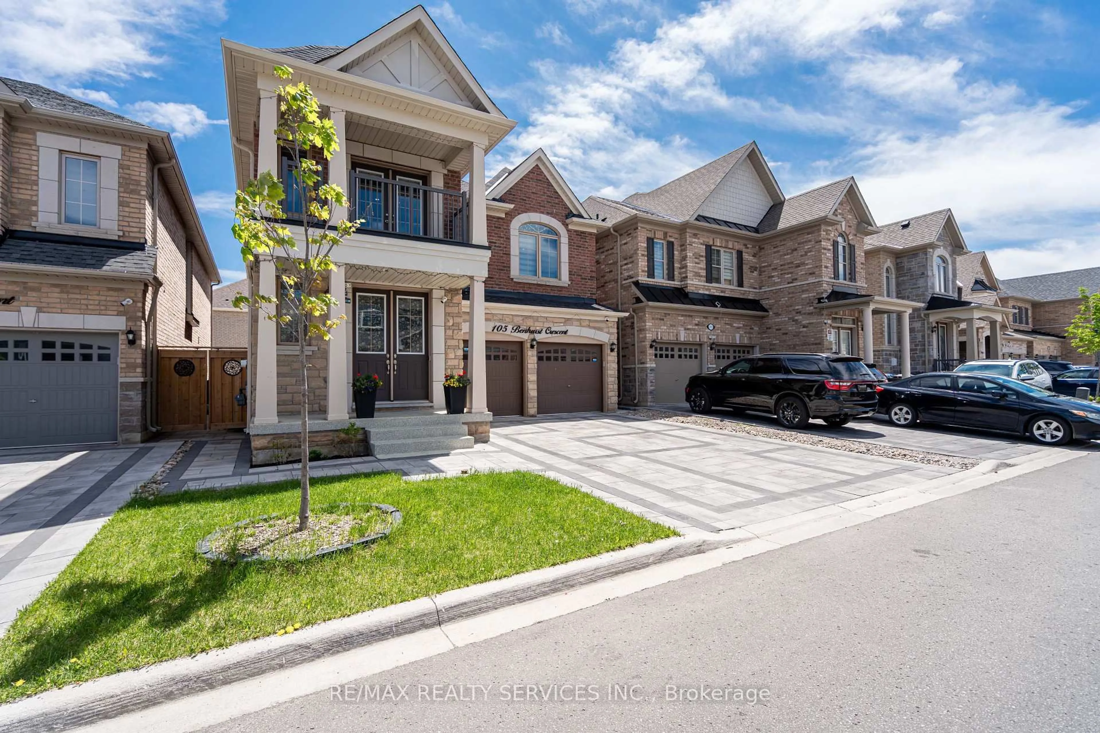Home with brick exterior material, street for 105 Benhurst Cres, Brampton Ontario L7A 5A4