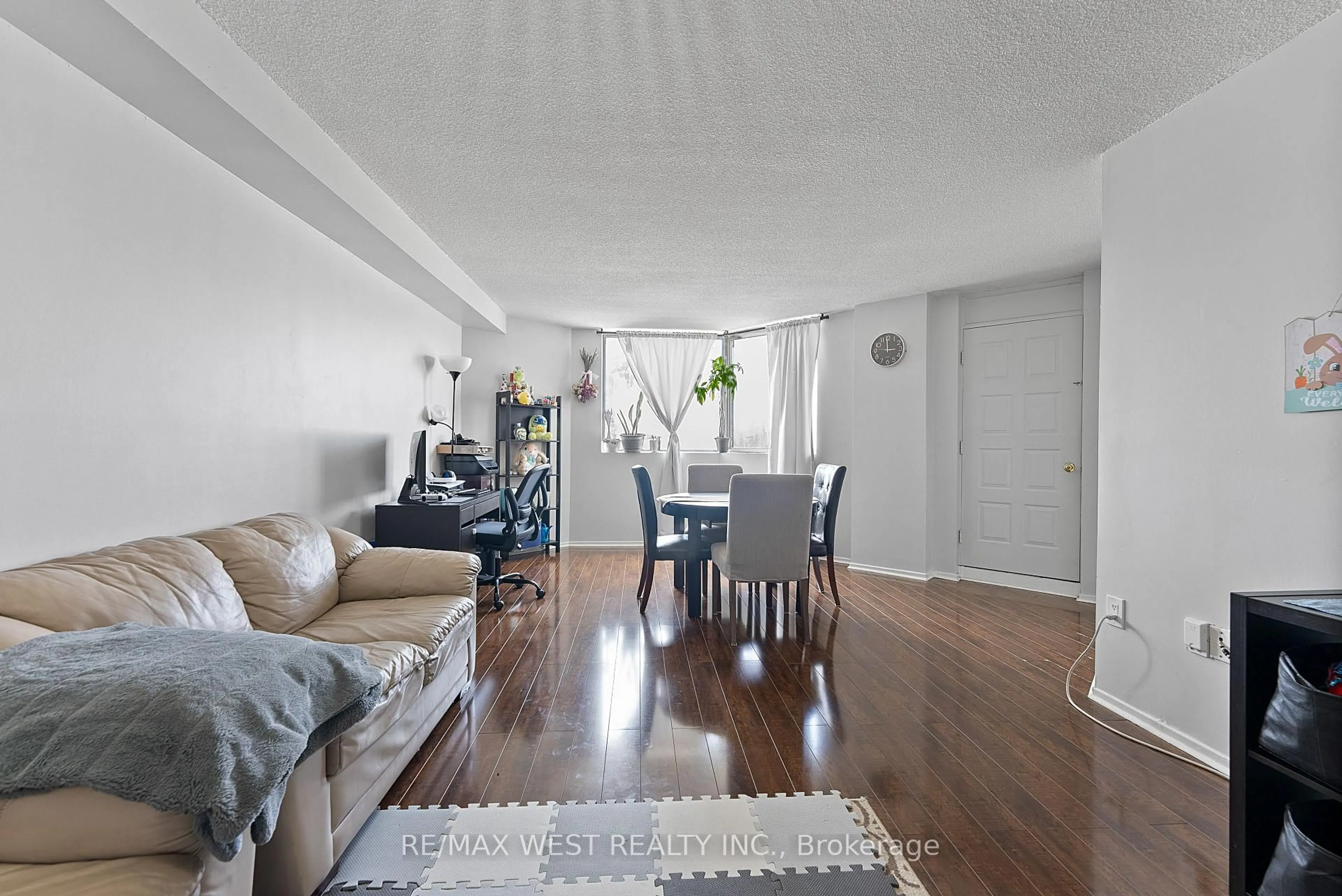 Living room with furniture, unknown for 238 Albion Rd #207, Toronto Ontario M9W 6A7