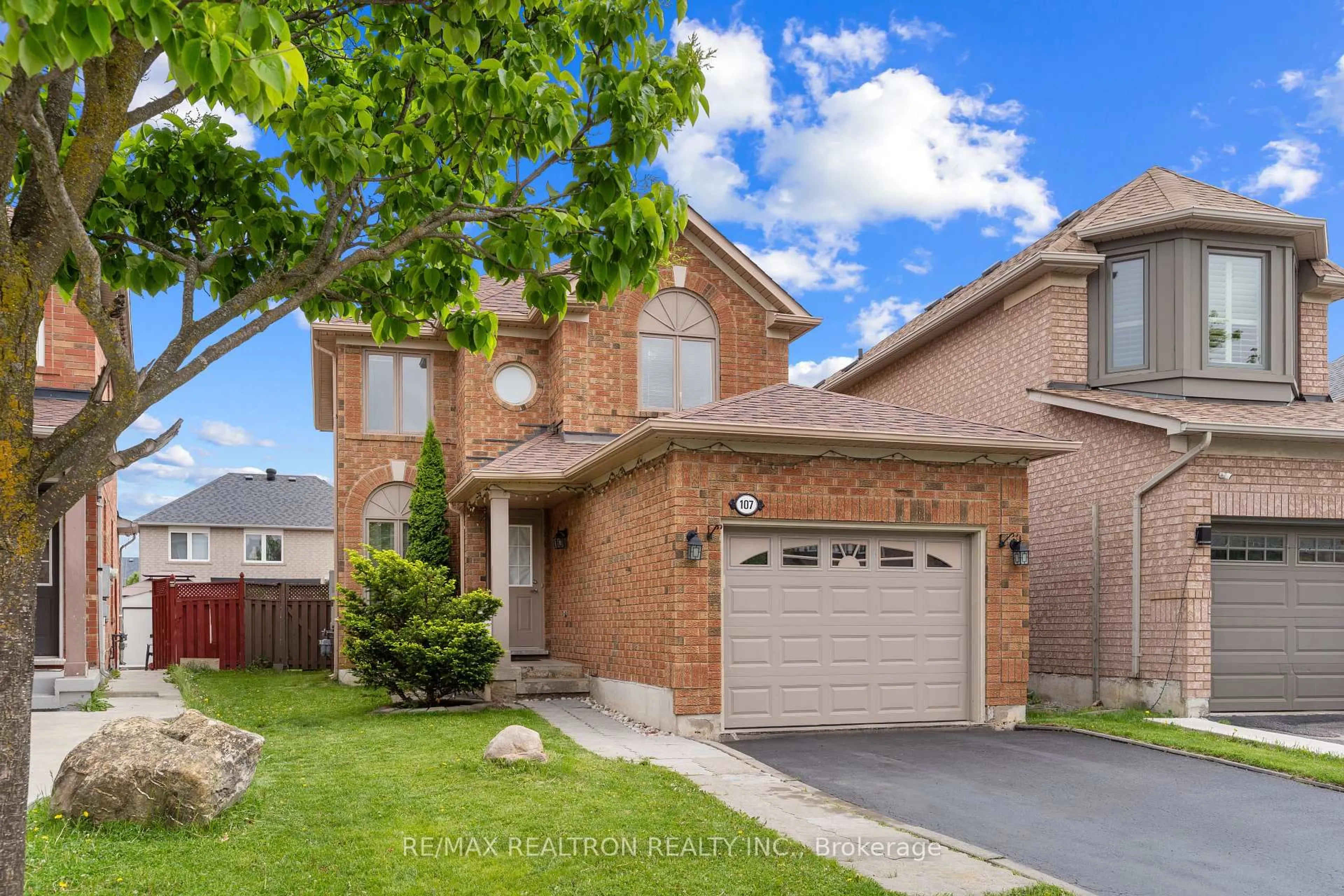 Home with brick exterior material, street for 107 Narrow Valley Cres, Brampton Ontario L6R 2M5