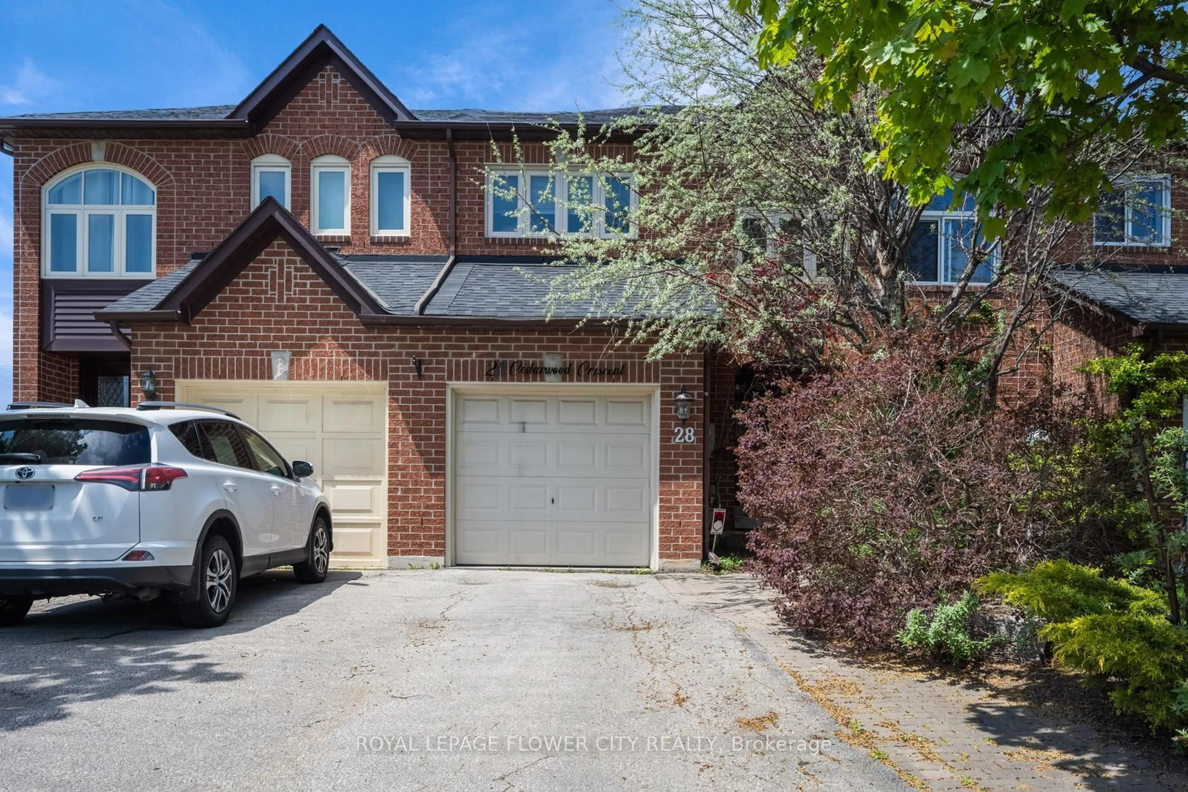 Home with brick exterior material, street for 28 Cedarwood Cres, Brampton Ontario L6X 4N6