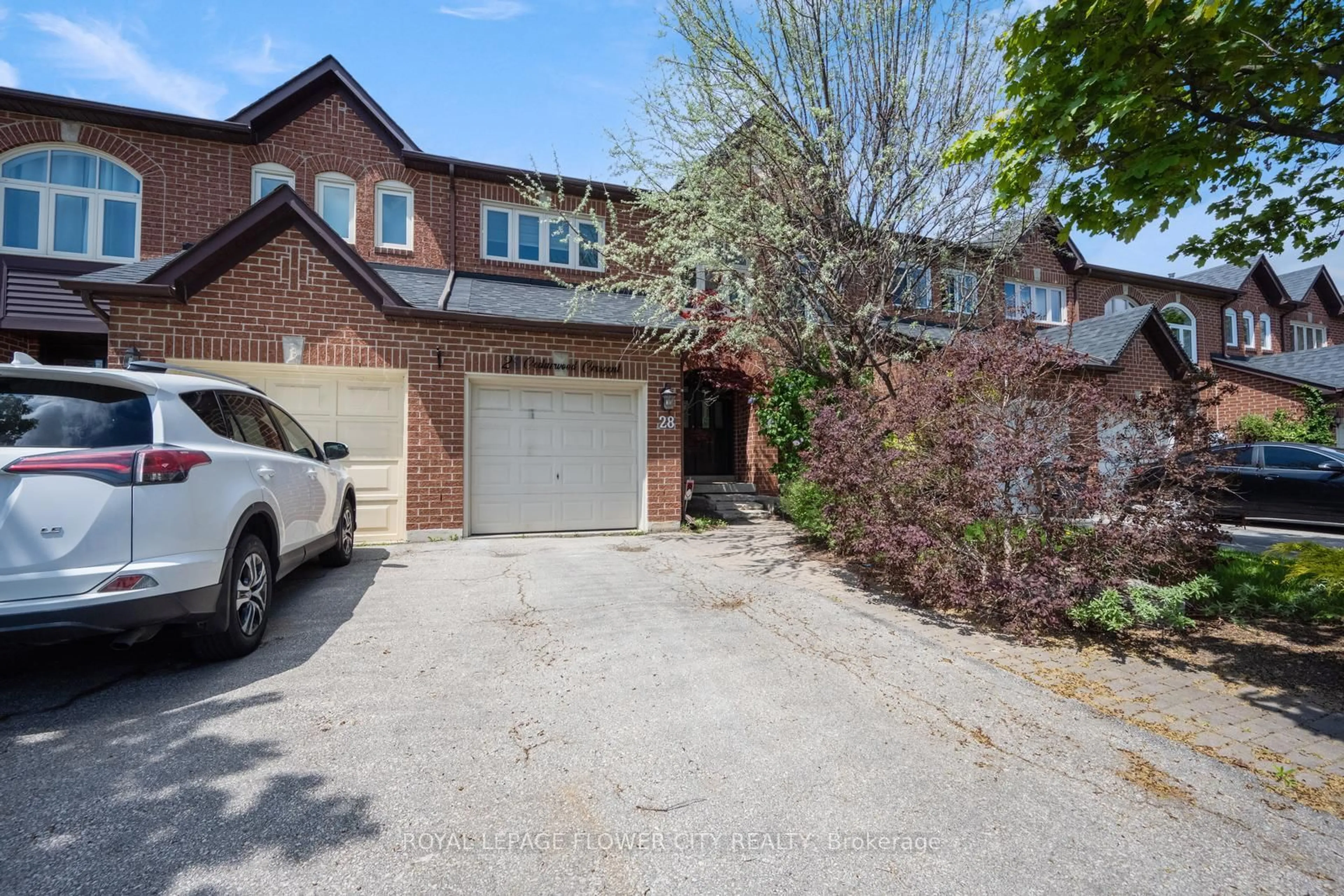 Home with brick exterior material, street for 28 Cedarwood Cres, Brampton Ontario L6X 4N6