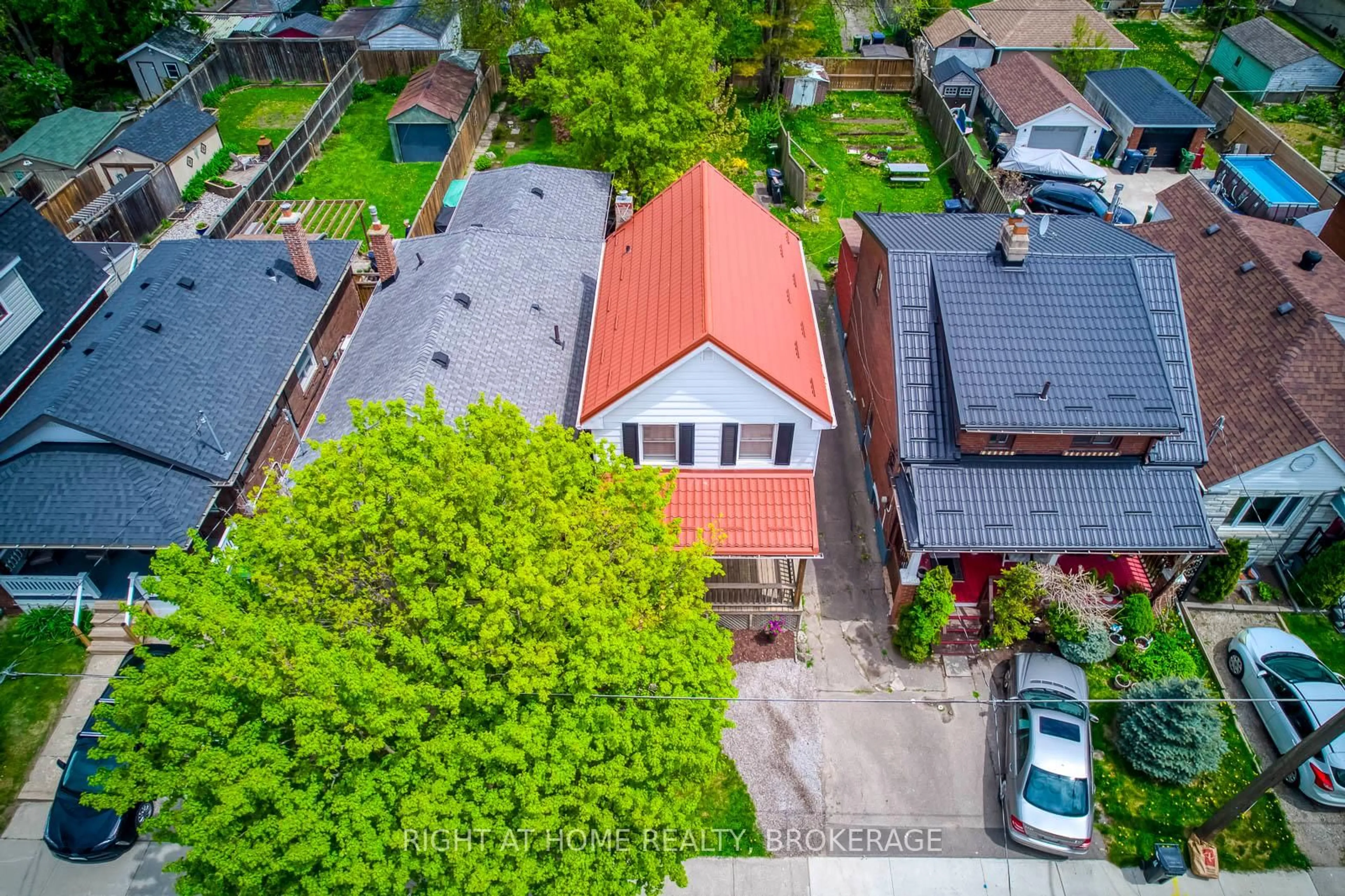 A pic from outside/outdoor area/front of a property/back of a property/a pic from drone, street for 39 Sixteenth St, Toronto Ontario M8V 3J7