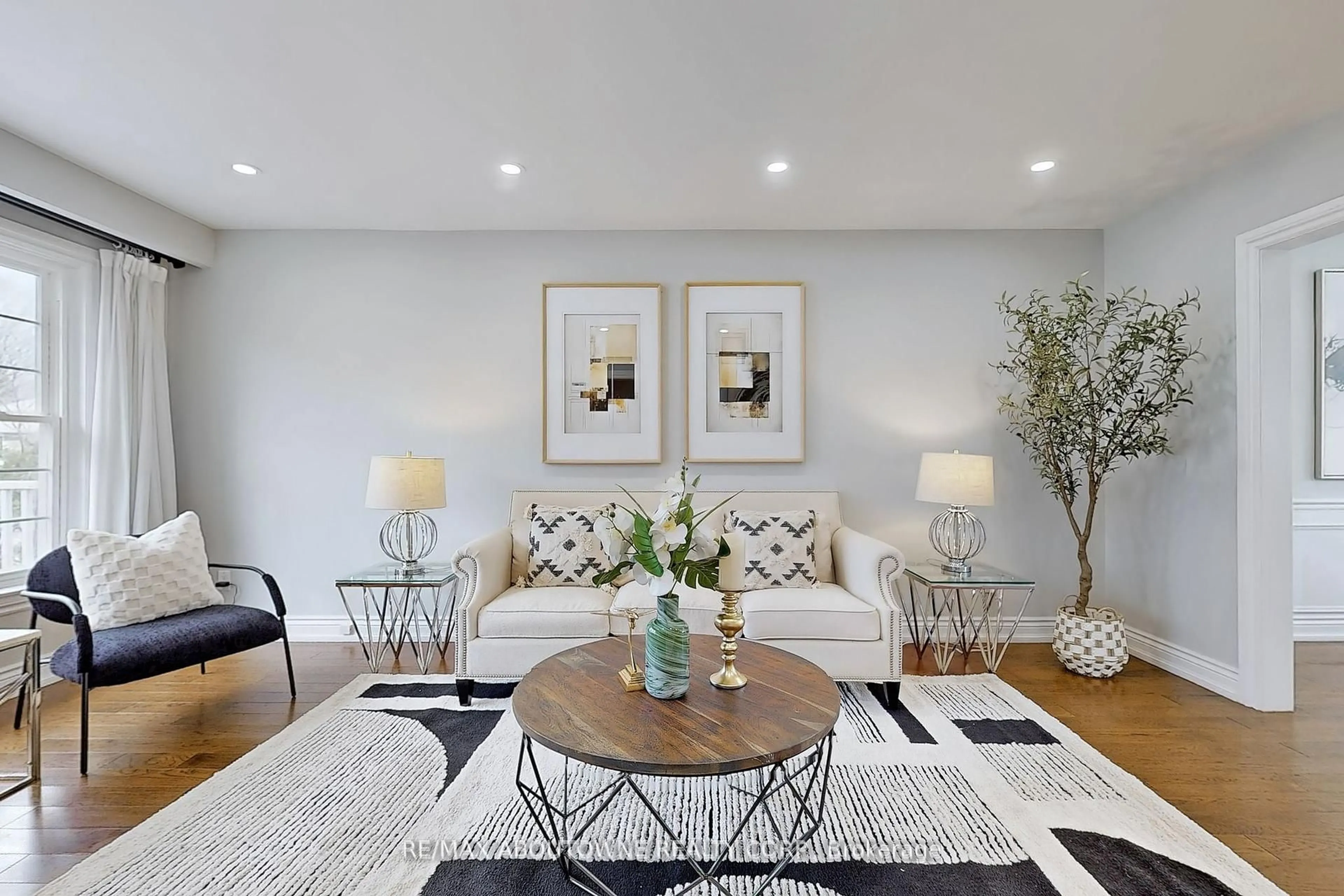 Living room with furniture, wood/laminate floor for 2362 Canso Rd, Oakville Ontario L6J 5W6