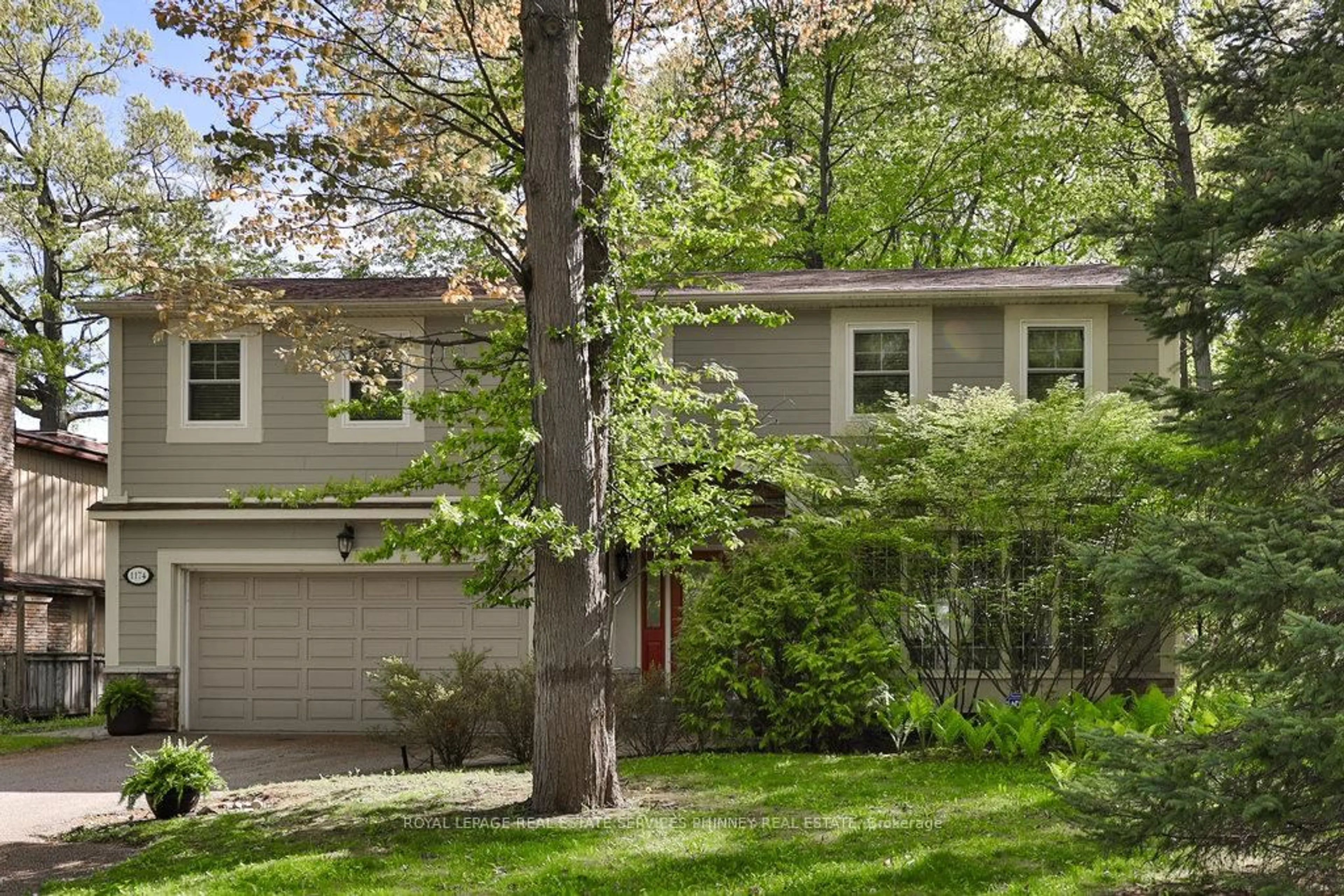 Home with vinyl exterior material, street for 1174 Whiteoaks Ave, Mississauga Ontario L5J 3B5