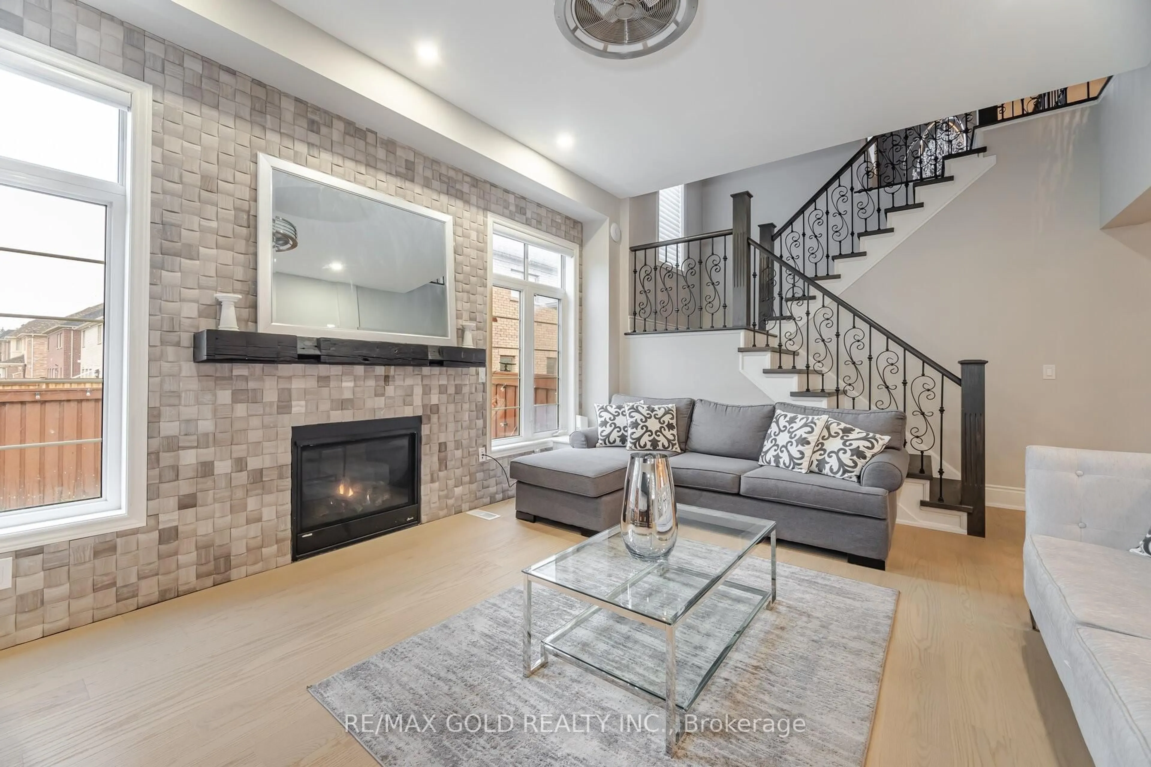 Living room with furniture, ceramic/tile floor for 78 Burlwood Rd, Brampton Ontario L6P 0T6