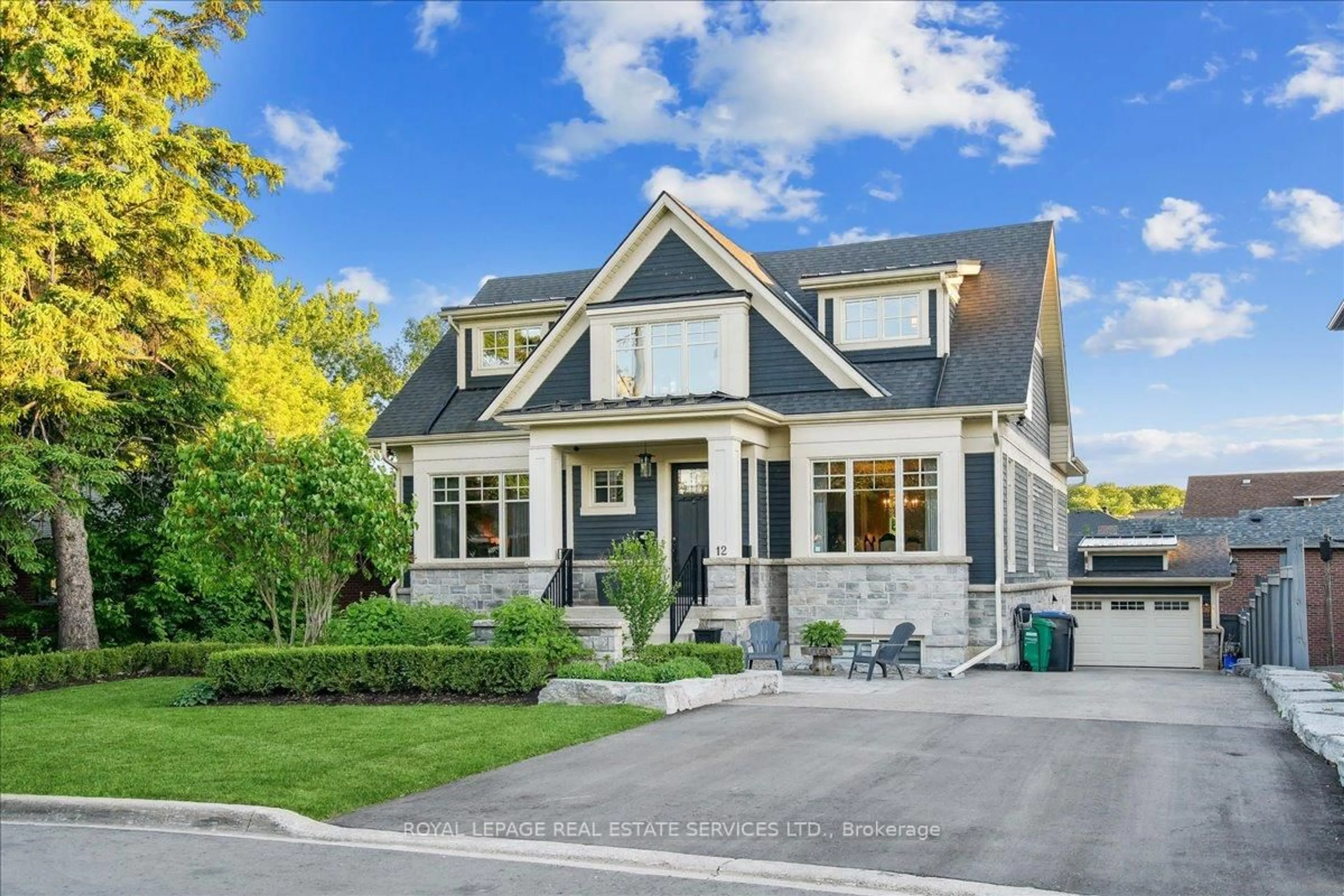 Home with brick exterior material, street for 12 Theodore Dr, Mississauga Ontario L5M 1E4