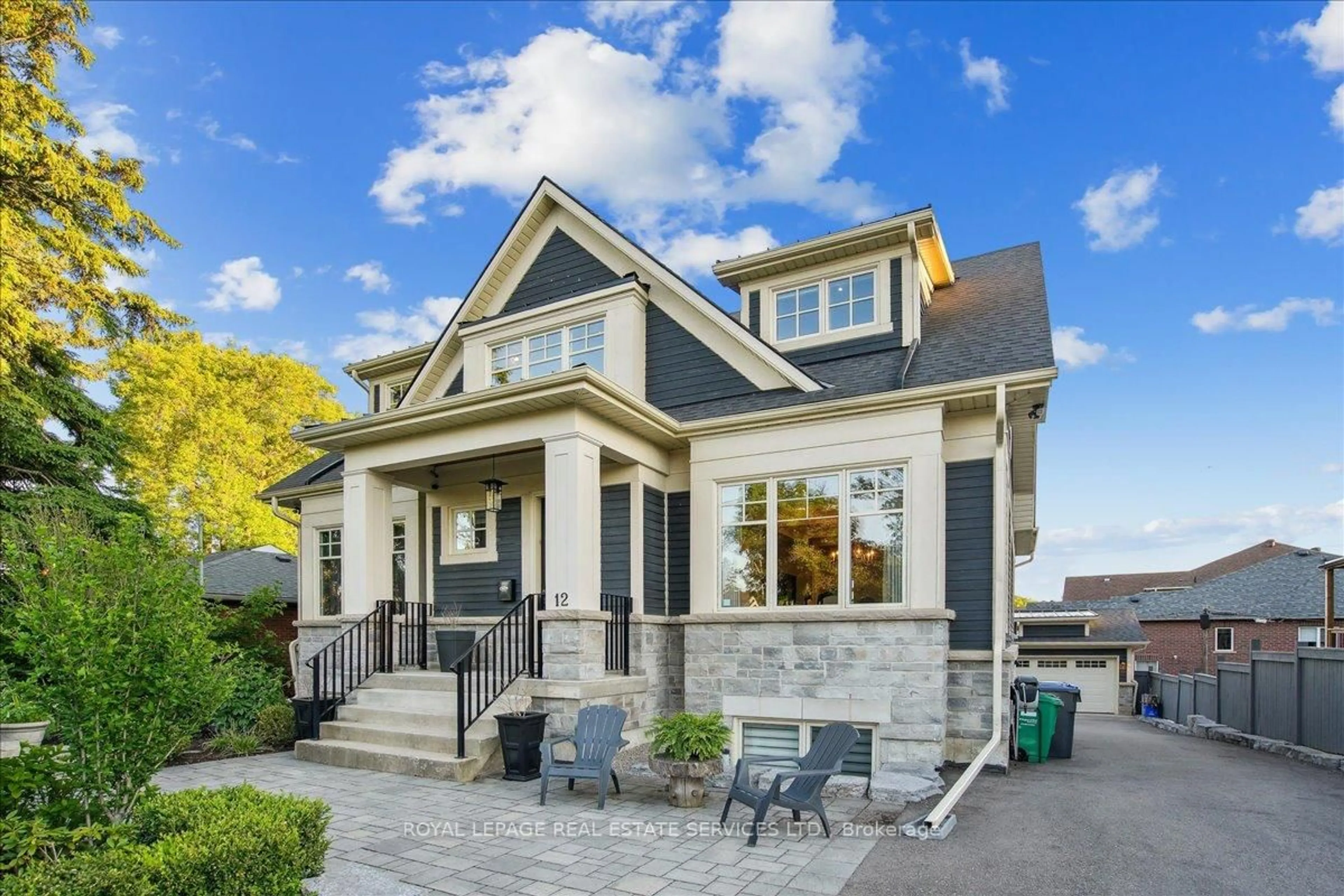 Home with brick exterior material, street for 12 Theodore Dr, Mississauga Ontario L5M 1E4