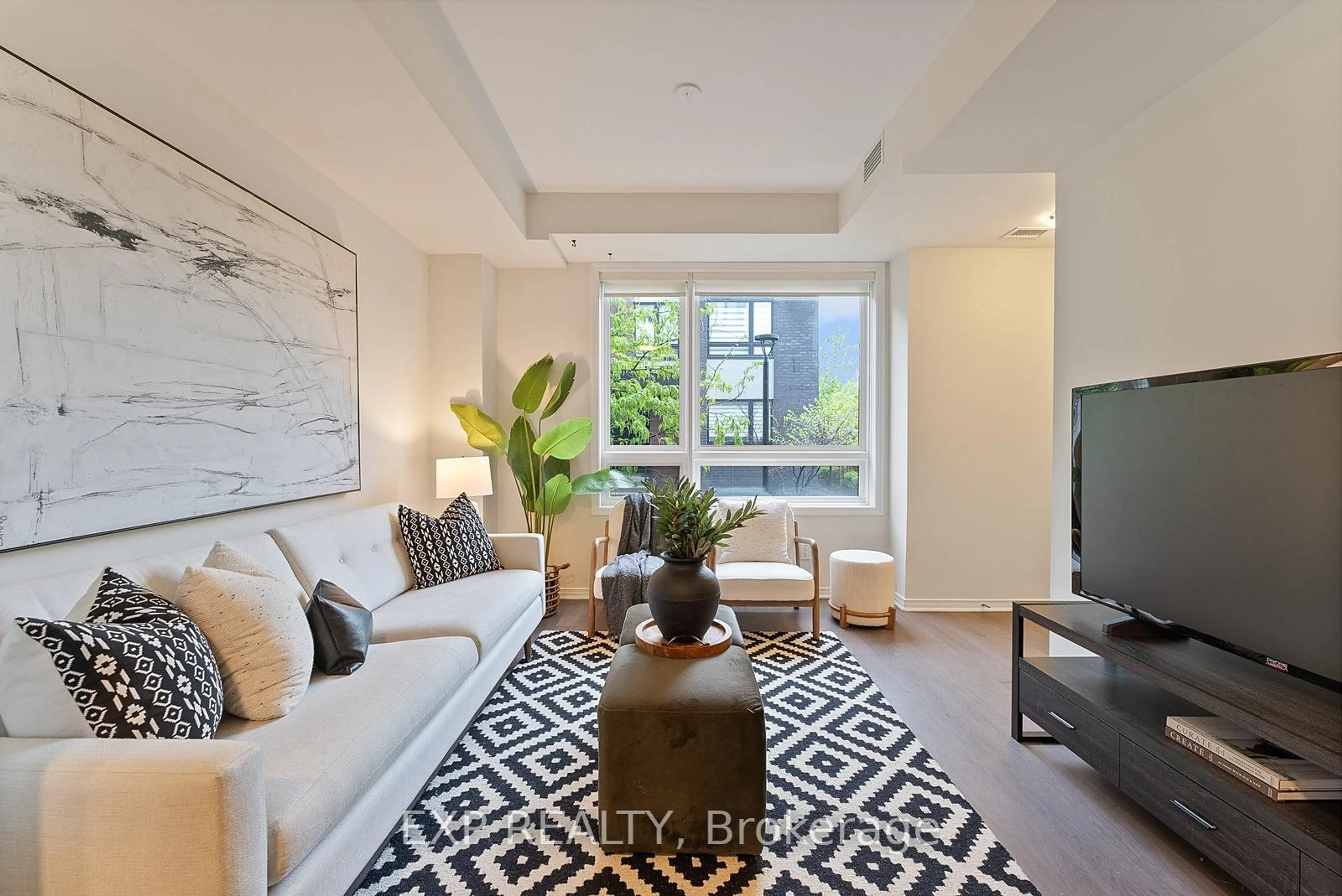 Living room with furniture, unknown for 1100 Briar Hill Ave #208, Toronto Ontario M6B 1M7