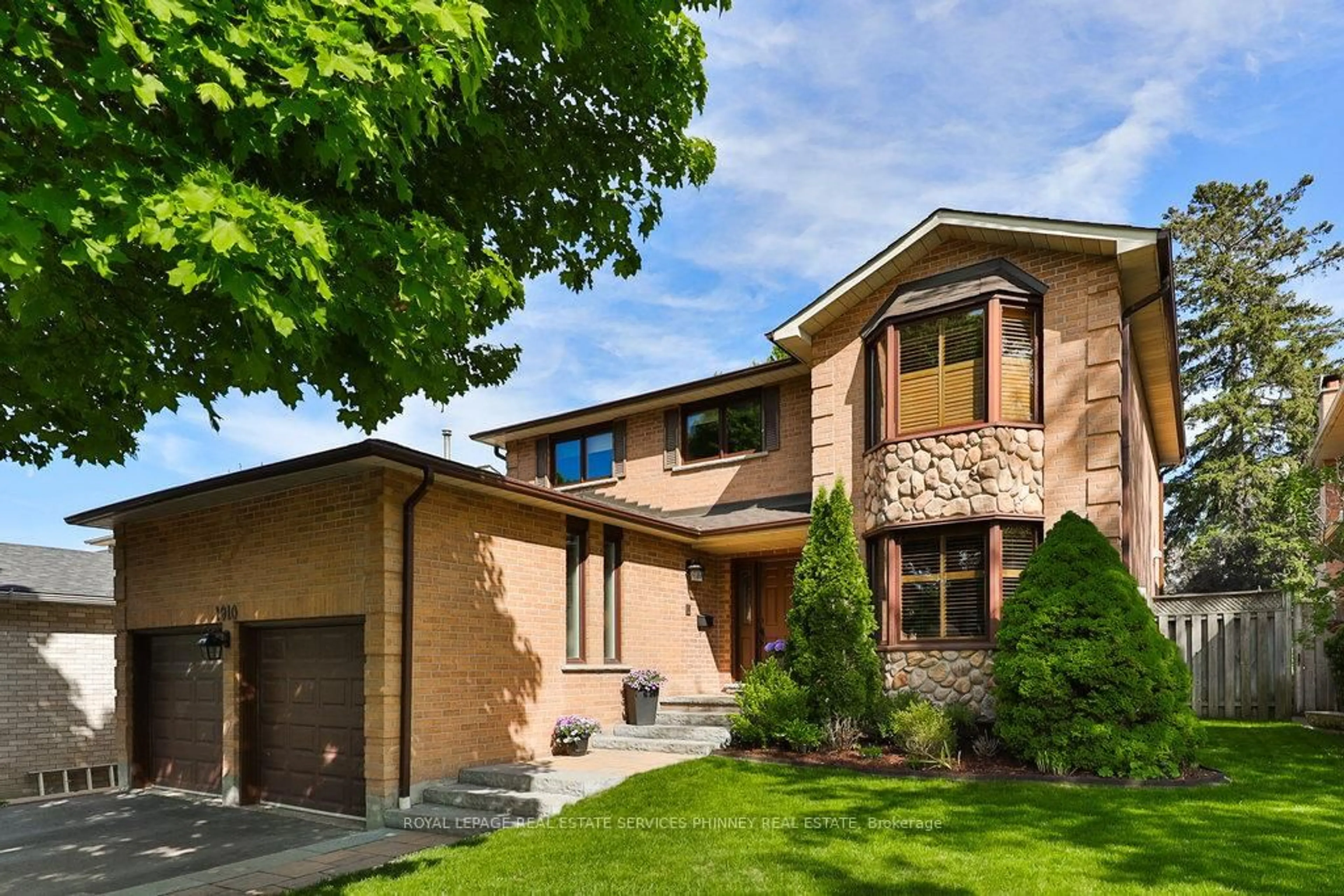 Home with brick exterior material, street for 1910 Stoneybrook Crt, Mississauga Ontario L5L 3W2