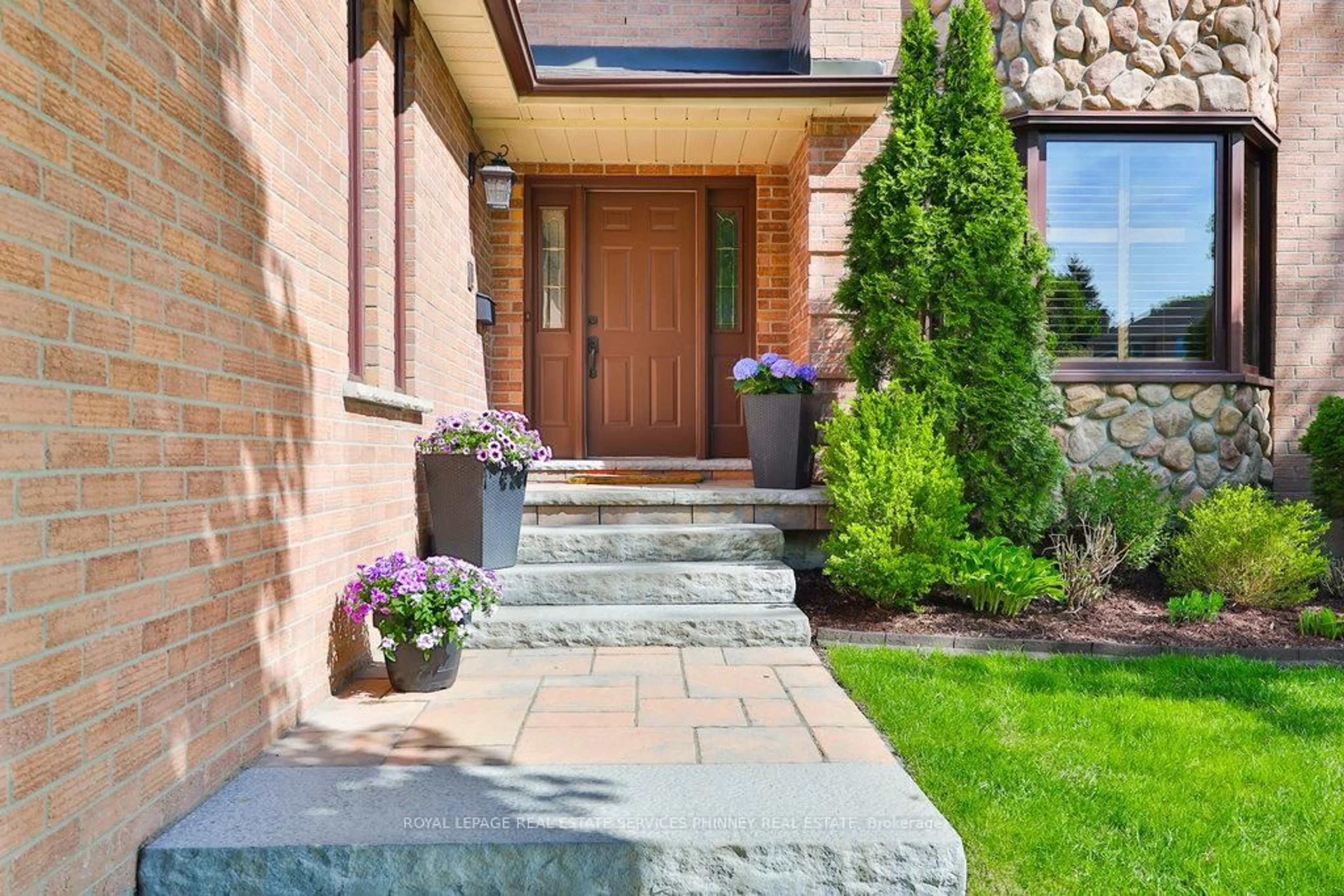 Home with brick exterior material, street for 1910 Stoneybrook Crt, Mississauga Ontario L5L 3W2