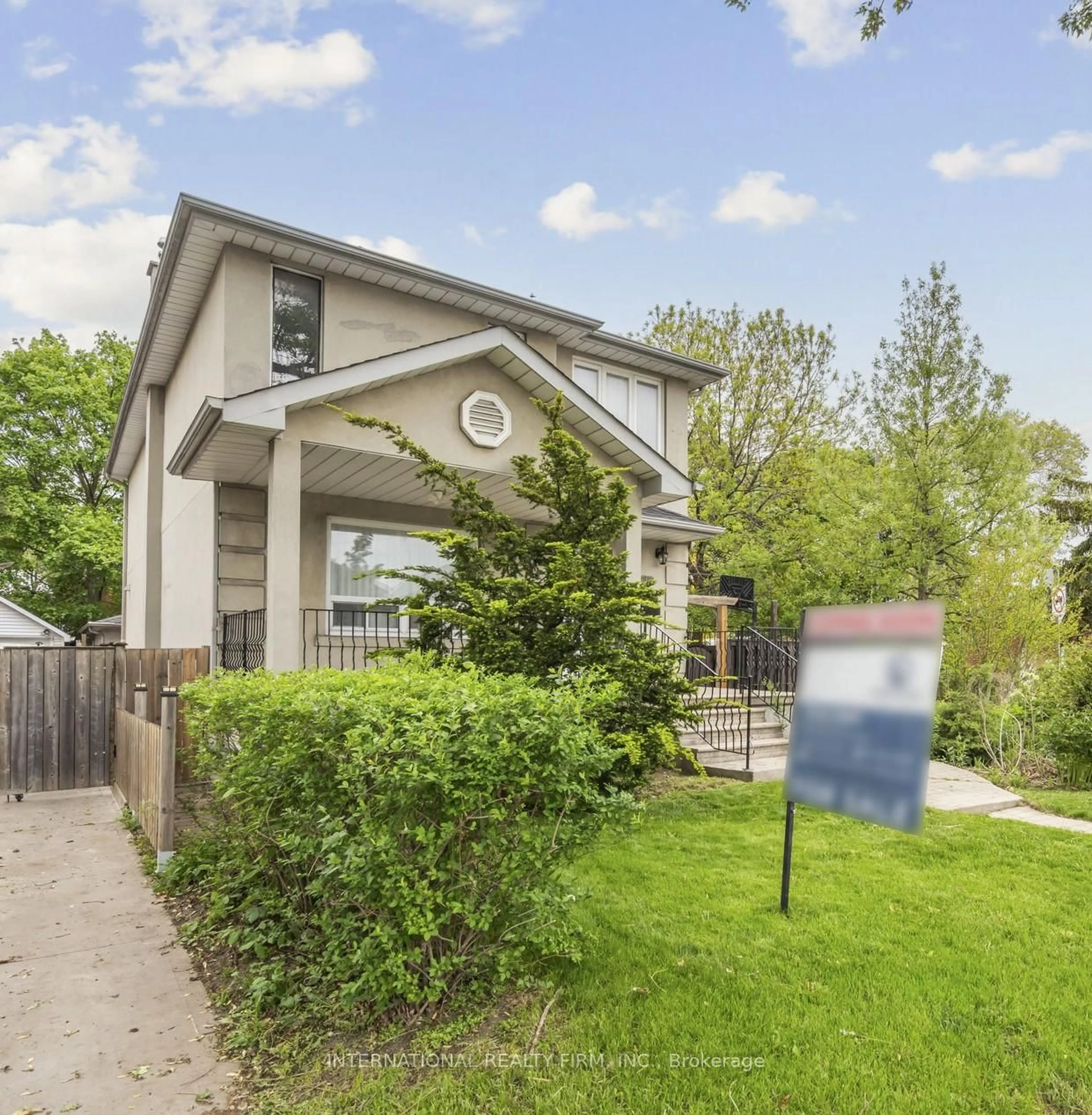 Home with brick exterior material, street for 1928 Lawrence Ave, Toronto Ontario M9N 1H2